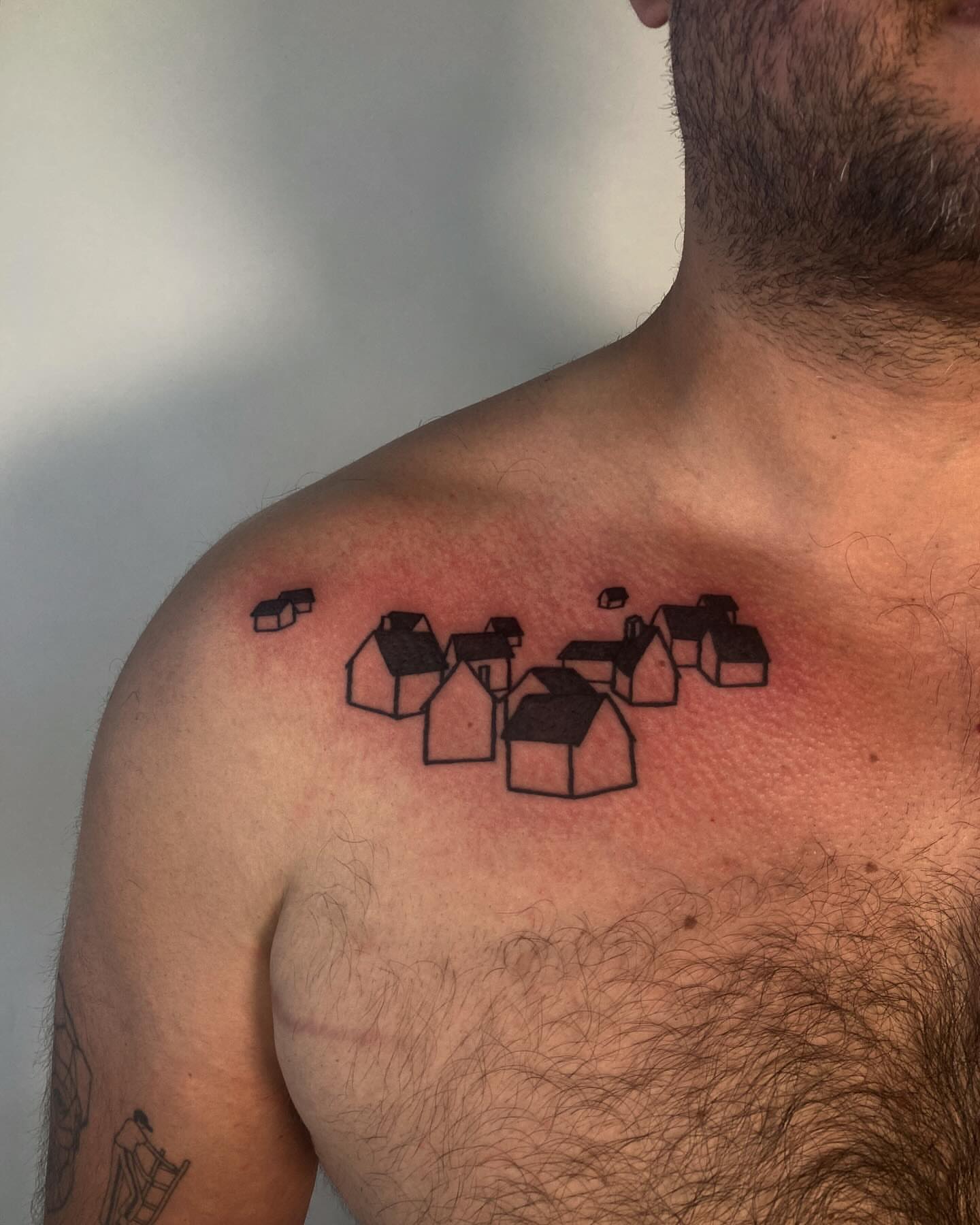 Houses geometric tattoo on the shoulder by james <3