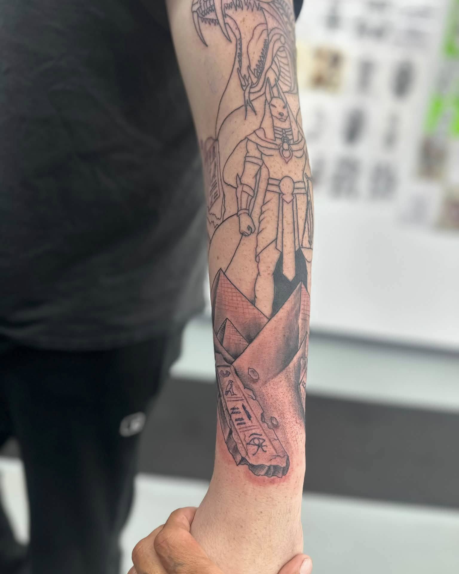 Anime character anime tattoo on the forearm by Brian Lambert