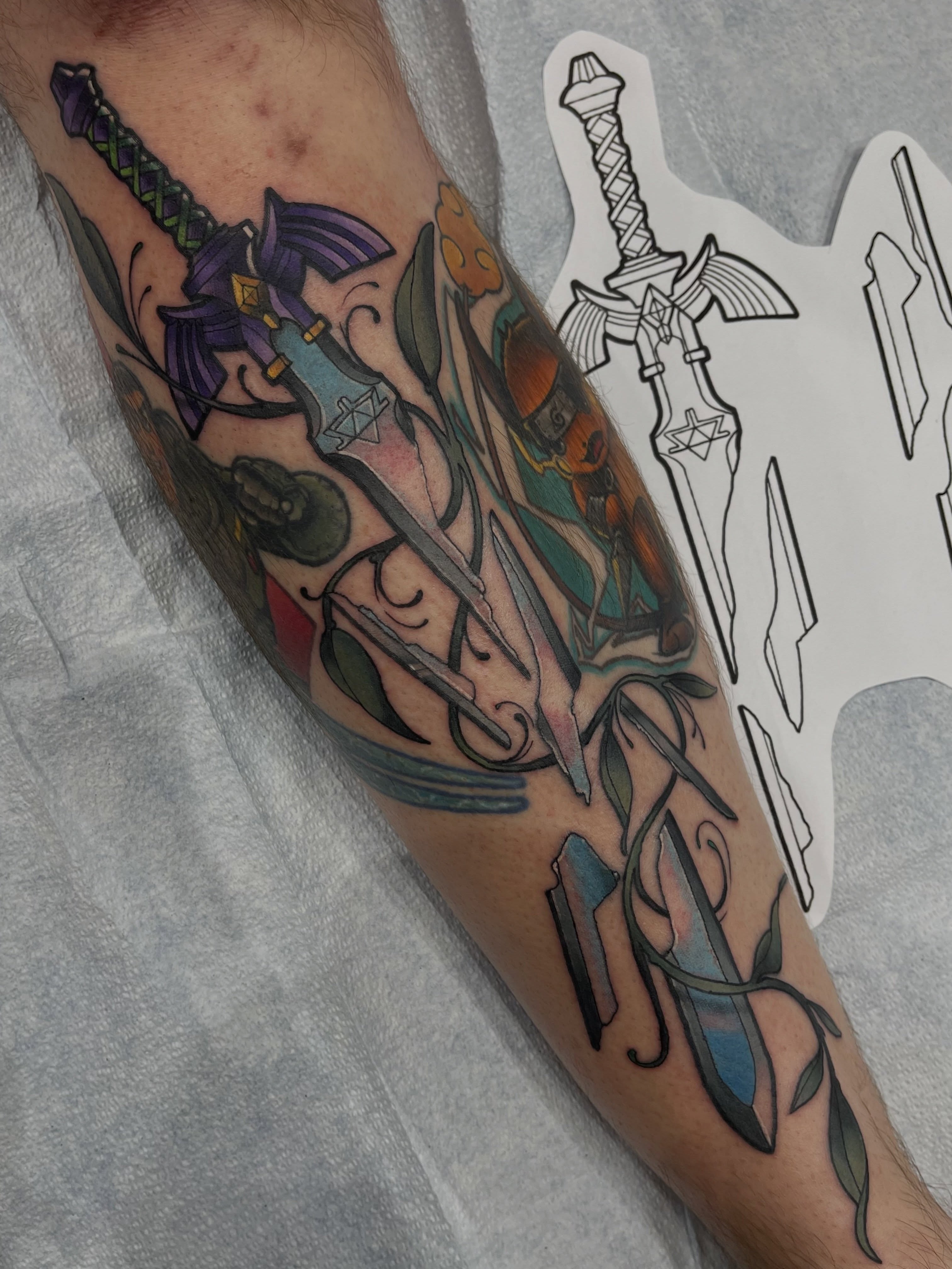 Sword and fantasy elements neo-traditional tattoo on the forearm by Chris Sparks, I just go by Sparks.