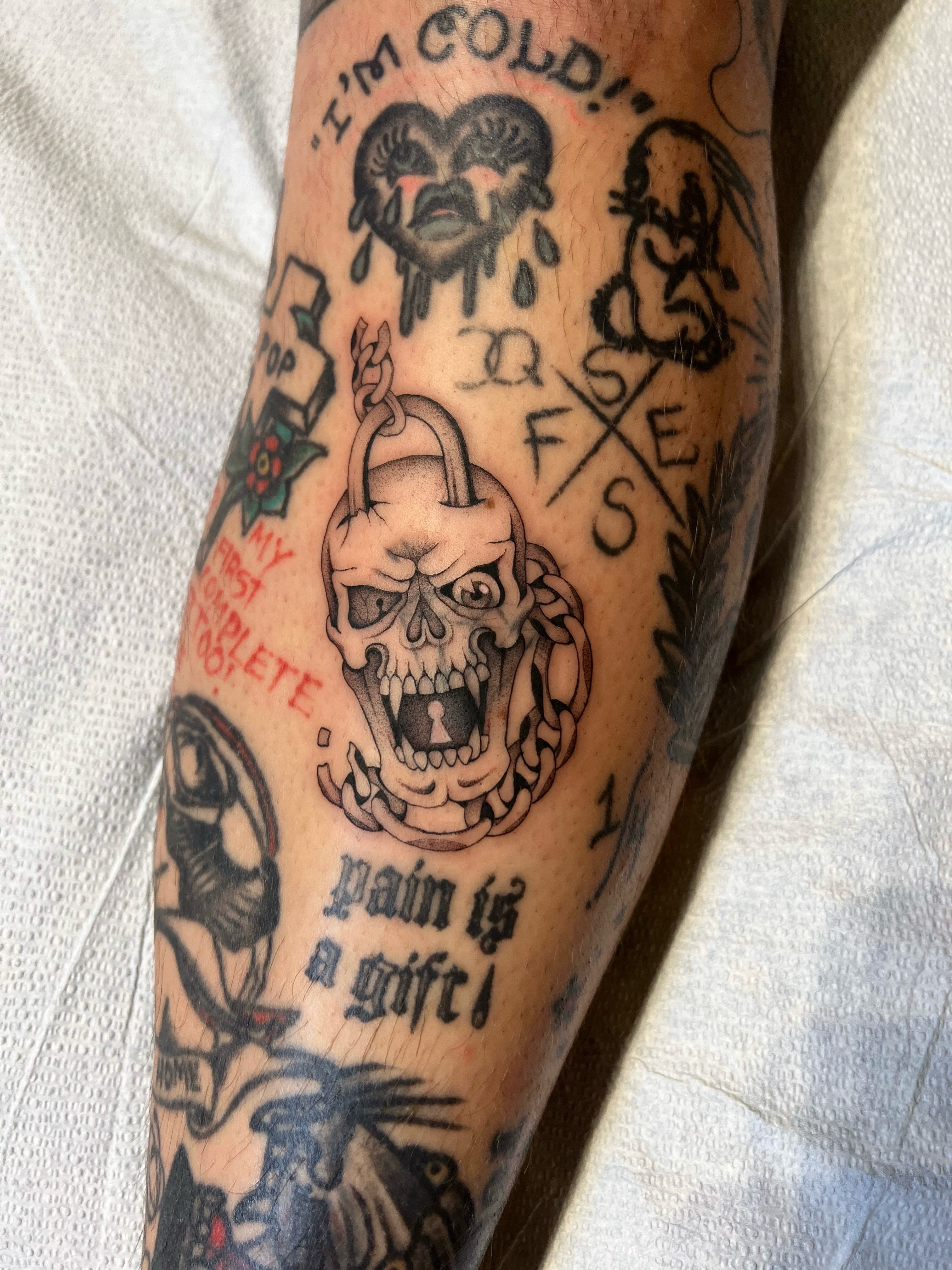 Skull bomb American traditional tattoo on the forearm by Mickey
