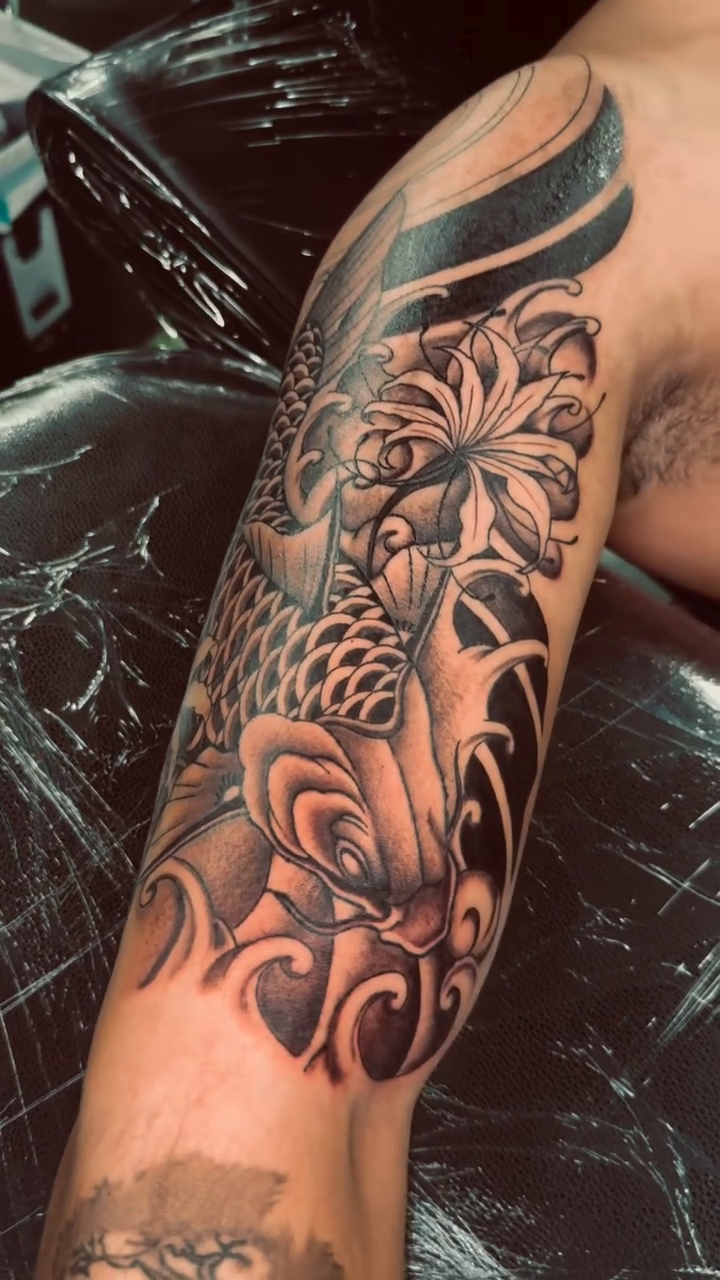 Koi fish and flowers japanese irezumi tattoo by Erik Pagtakhan