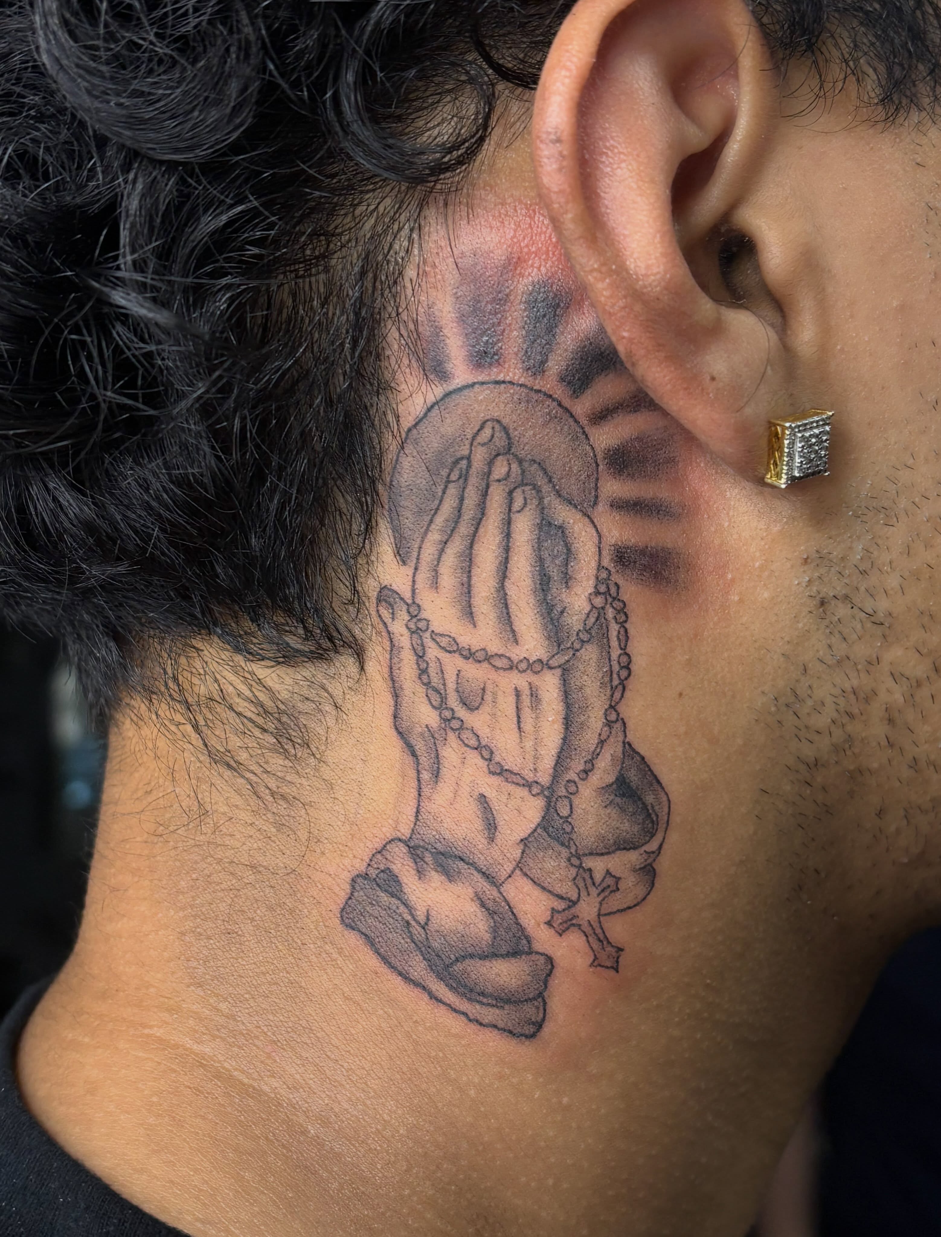 Praying hands with rosary black and grey tattoo on the neck by destiny🌞