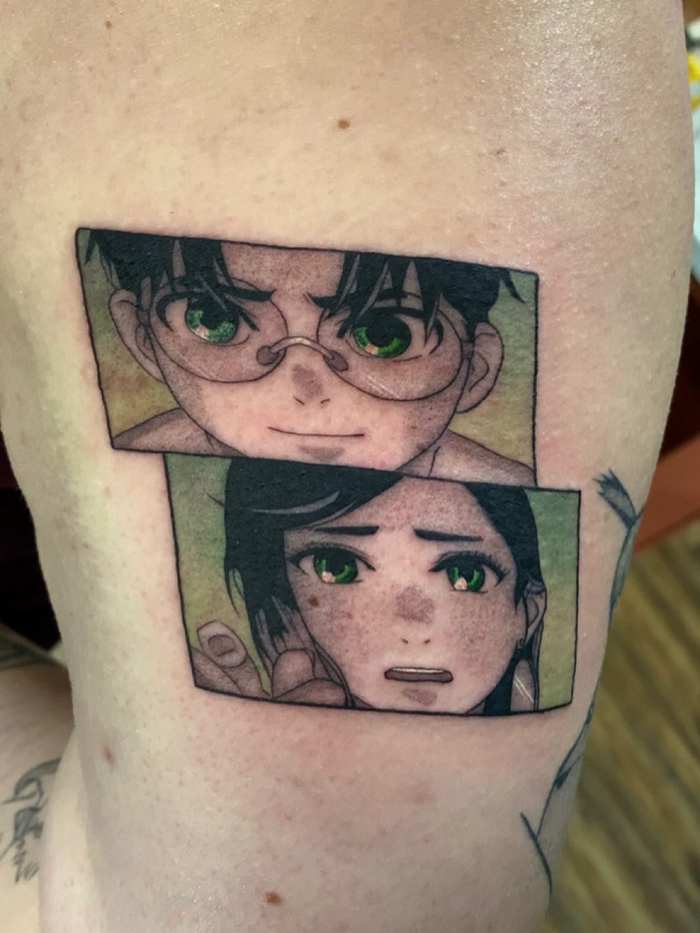 Anime characters anime tattoo on the thigh by Maddie Rees