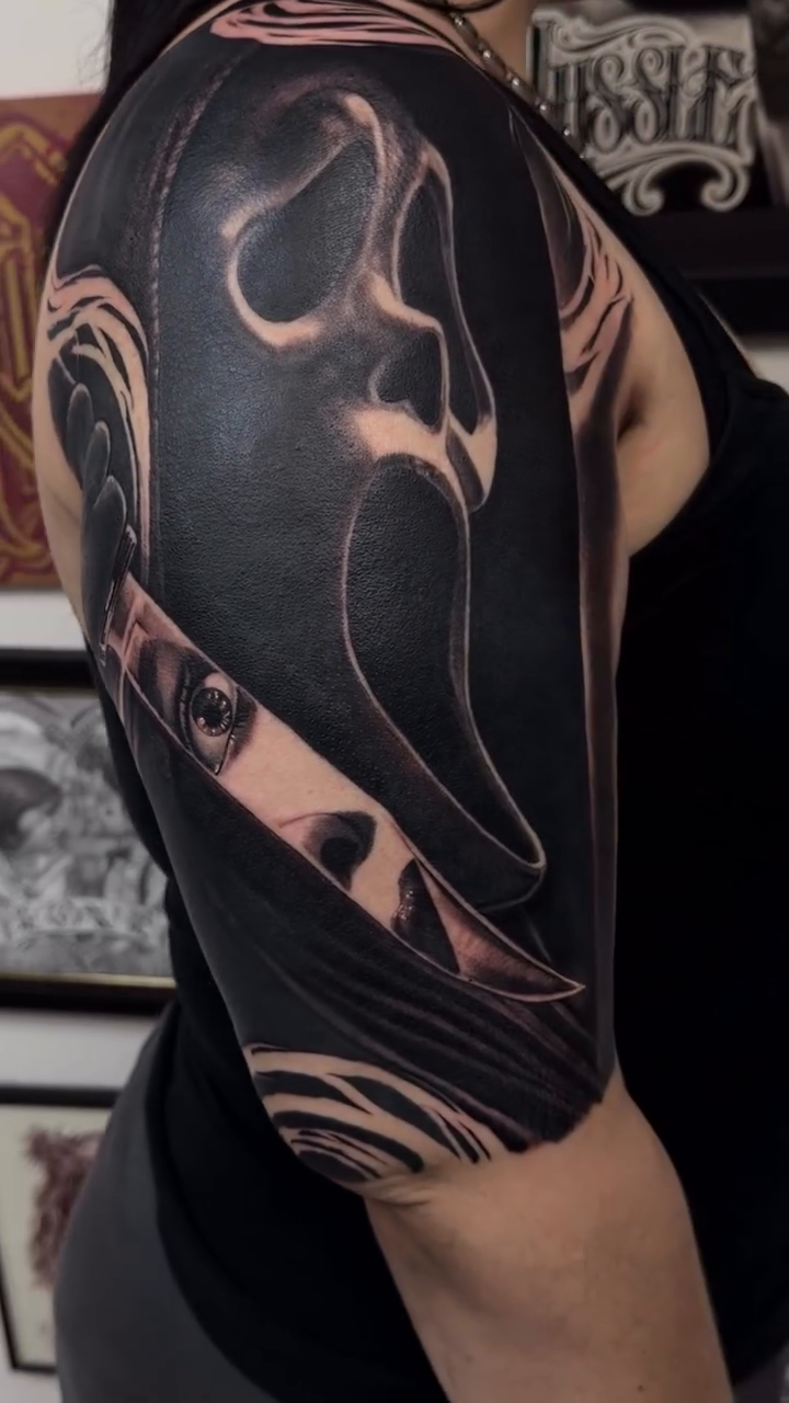 Ghostface mask blackwork tattoo by Richie Moreno lll