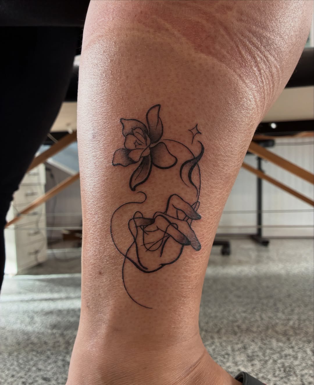 Lotus flowers minimalist tattoo on the calf by Xin.H