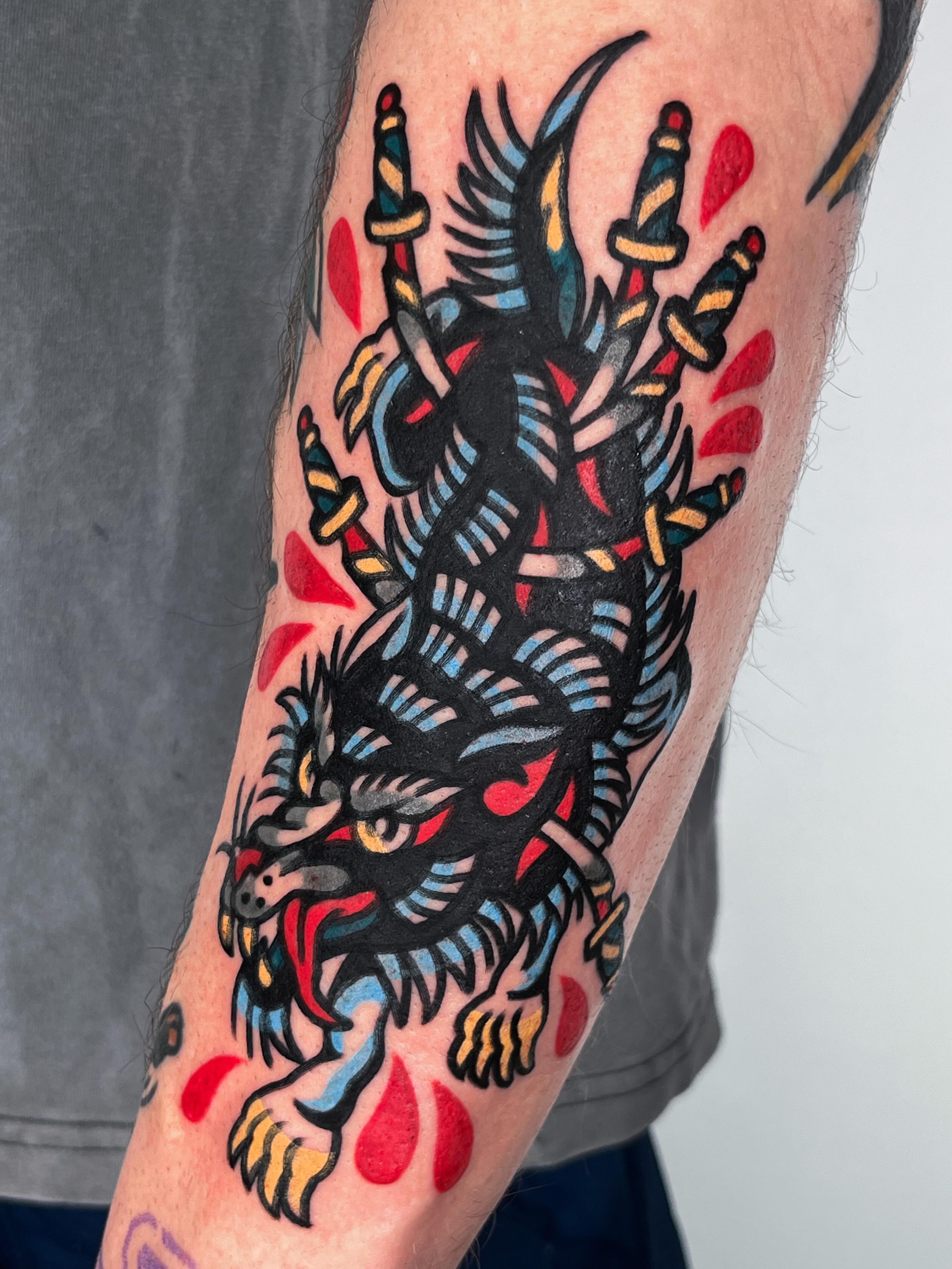 Demon with candles American traditional tattoo on the forearm by Oldschool Tattooer Takii 타키
