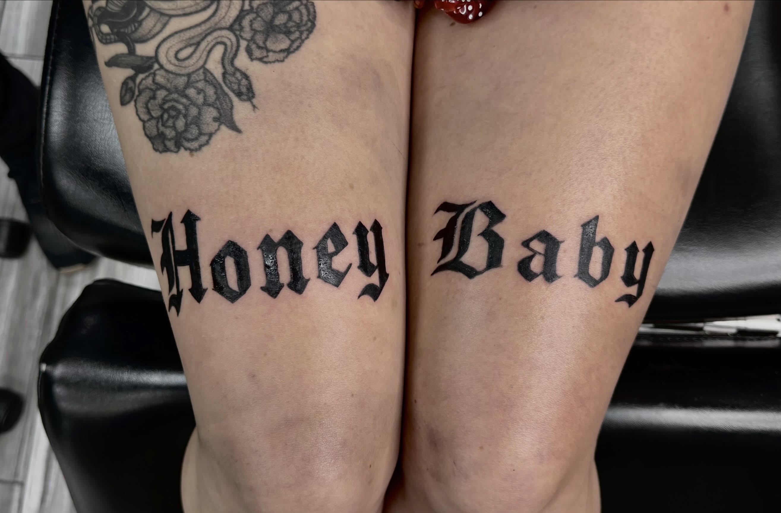Honey Baby lettering script tattoo on the leg by rylie :P