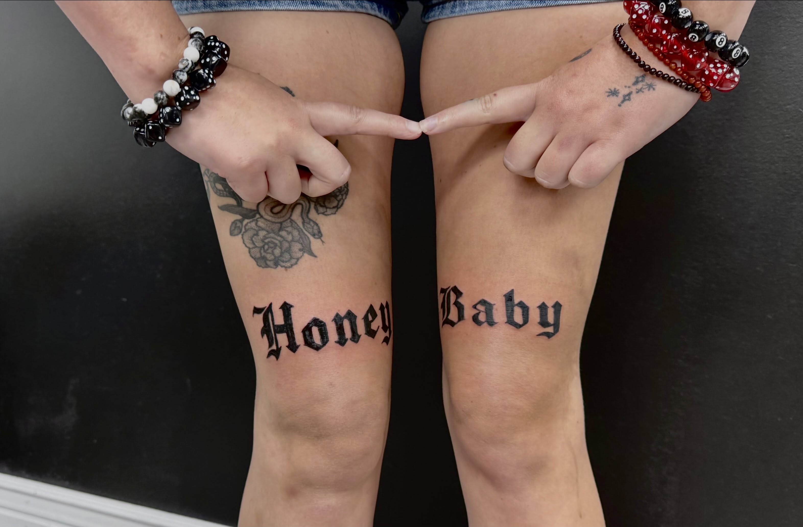 Honey Baby lettering script tattoo on the leg by rylie :P