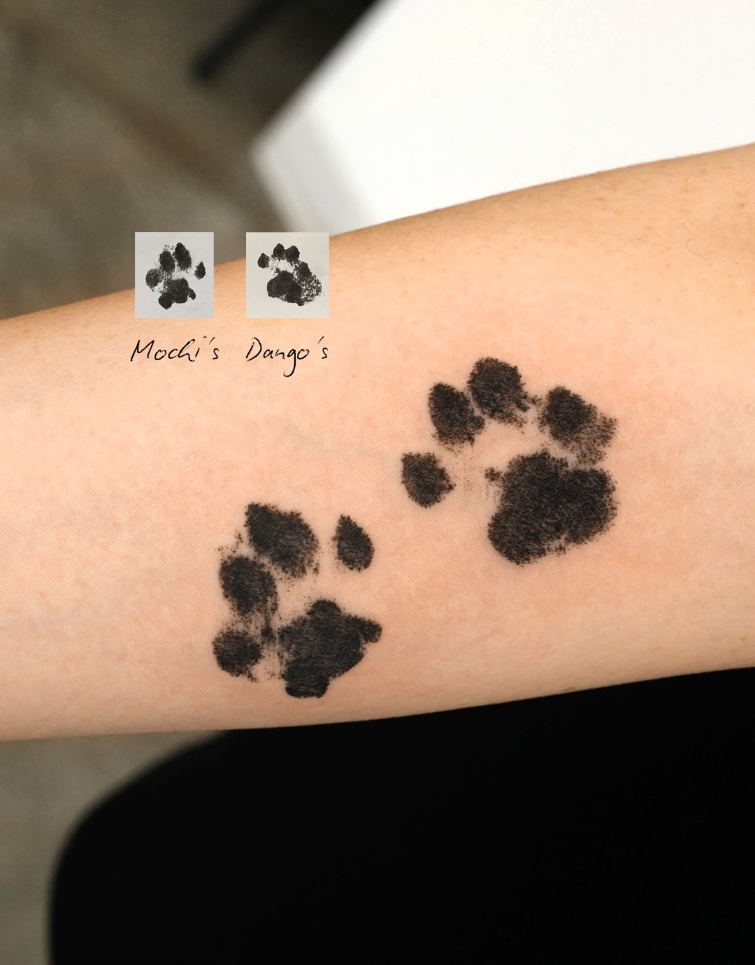 Paw prints dotwork tattoo on the forearm by Ria Kim 김리아