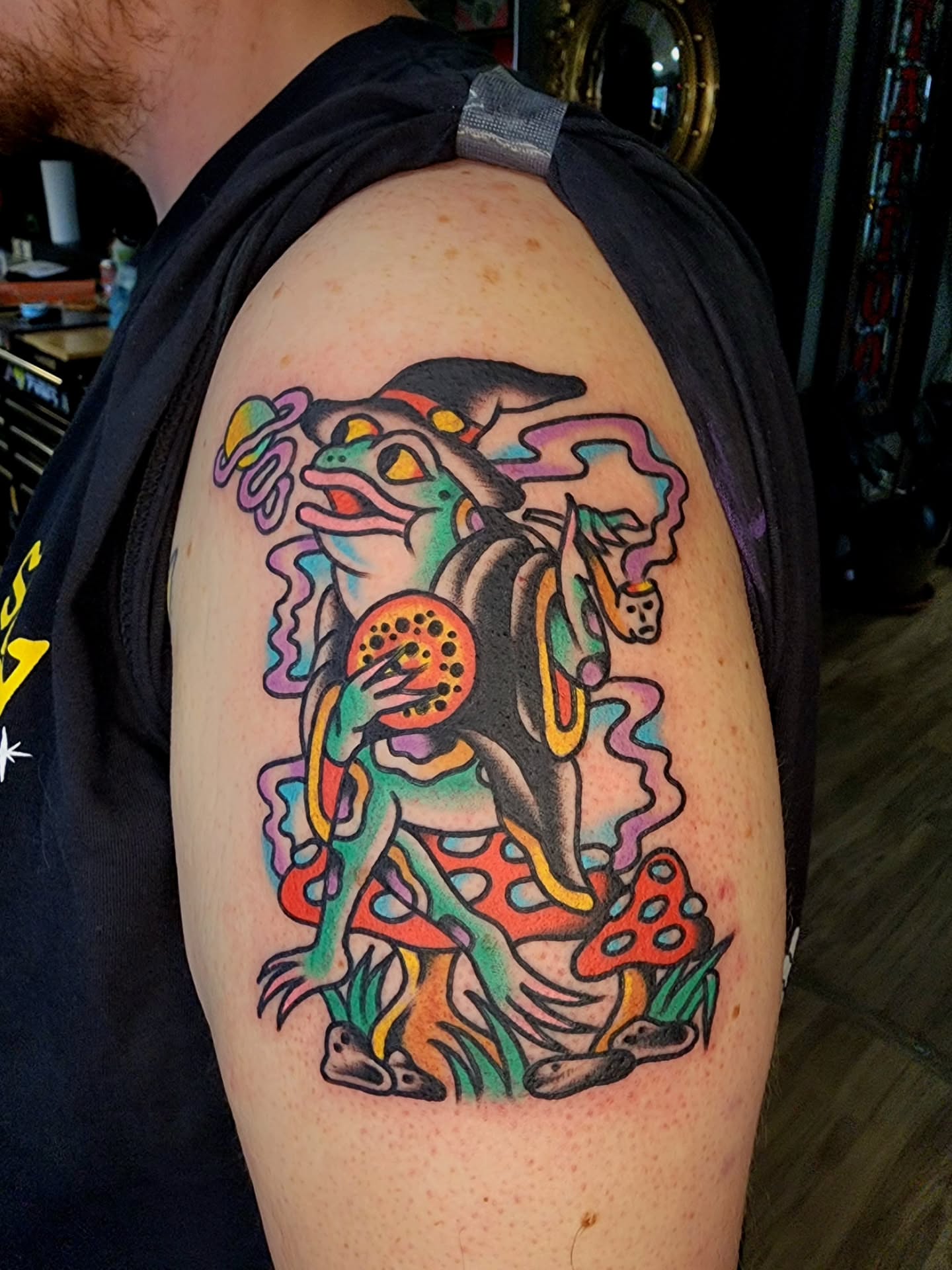 Frog and mushrooms new school tattoo on the shoulder by πππππ