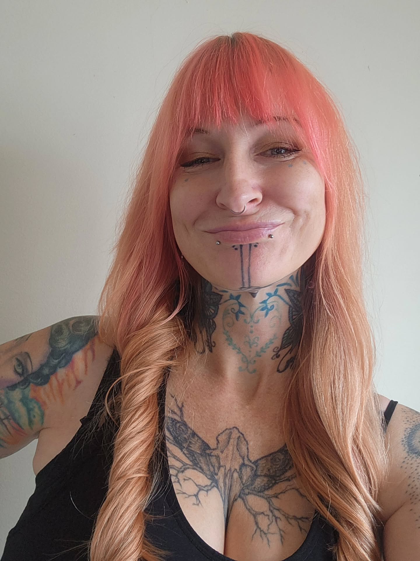 Floral black and grey tattoo on the neck by Heather
