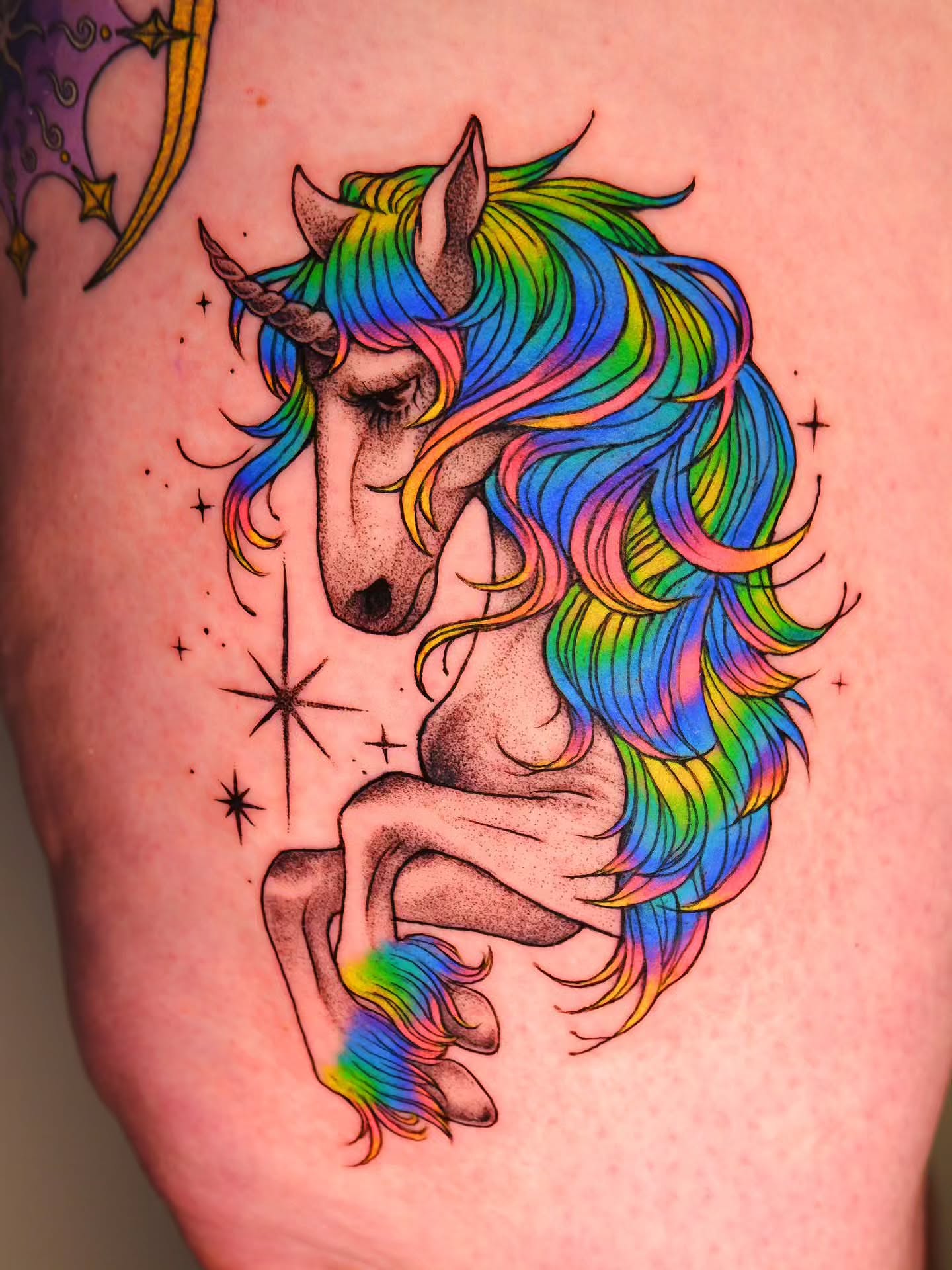 Rainbow unicorn dotwork tattoo on the thigh by bird ✦ tattoo artist ✦ philadelphia