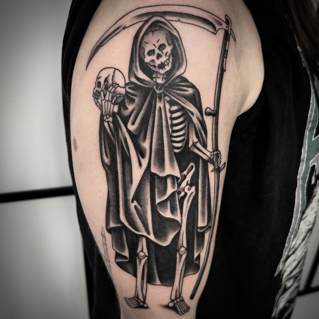 Grim reaper black and grey tattoo on the shoulder by Sean McMahon