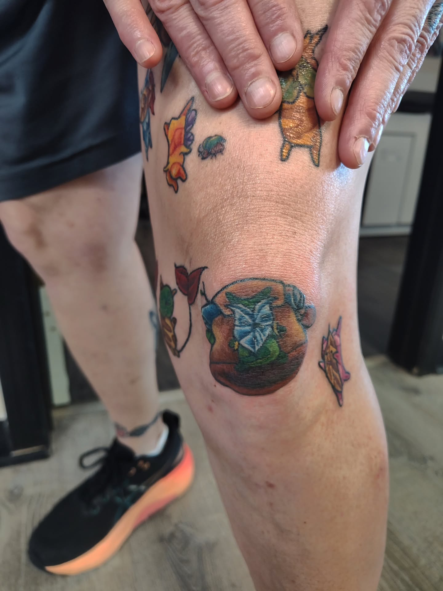 Basket with flowers dotwork tattoo on the thigh by Mercury