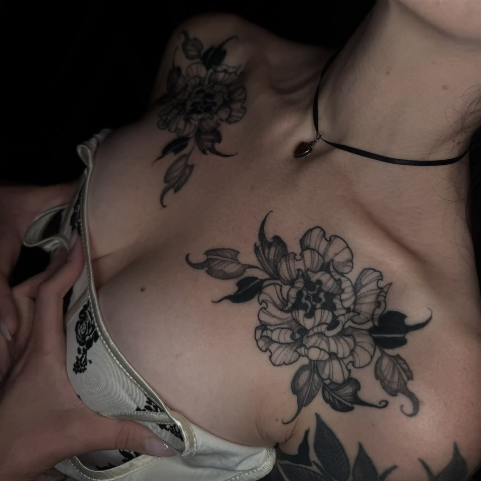 Peony black and grey tattoo on the chest by ๐ฎ๐๐๐ ๐ท๐๐๐๐ ๐ฑ๐๐๐๐๐