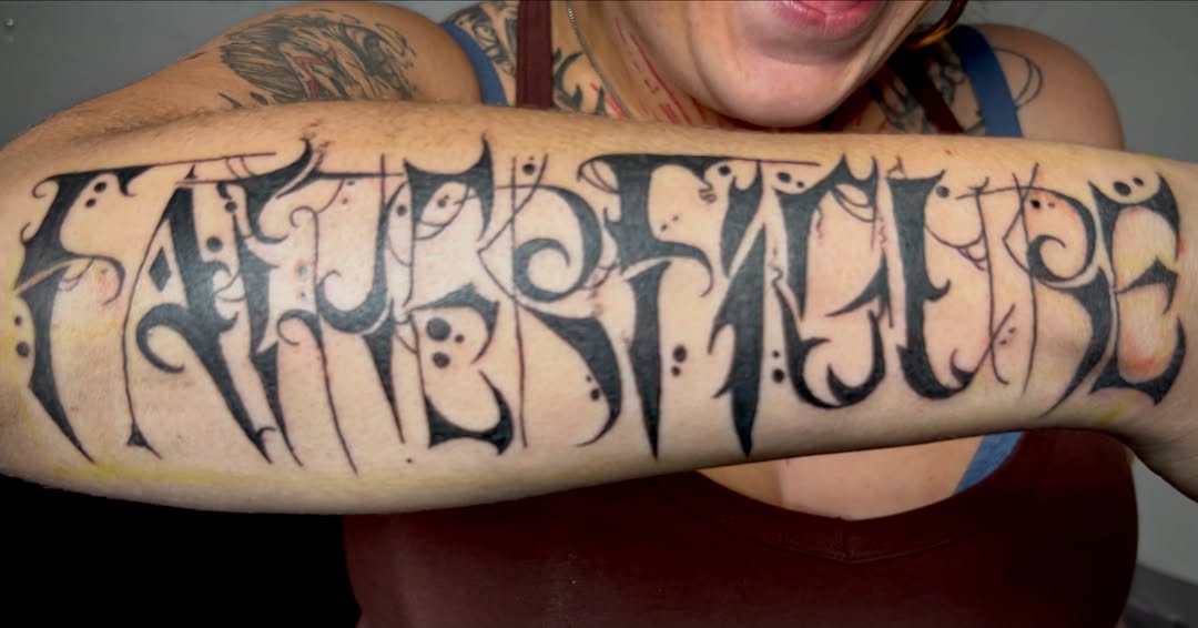 Lettering lettering script tattoo on the forearm by Rayne