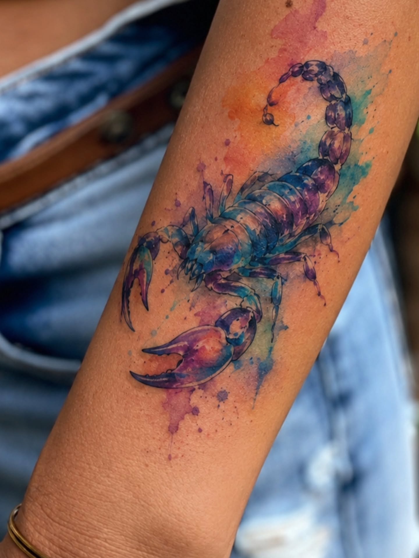Scorpion watercolor tattoo on the forearm by Dr. Valerio Vegas Tattoo