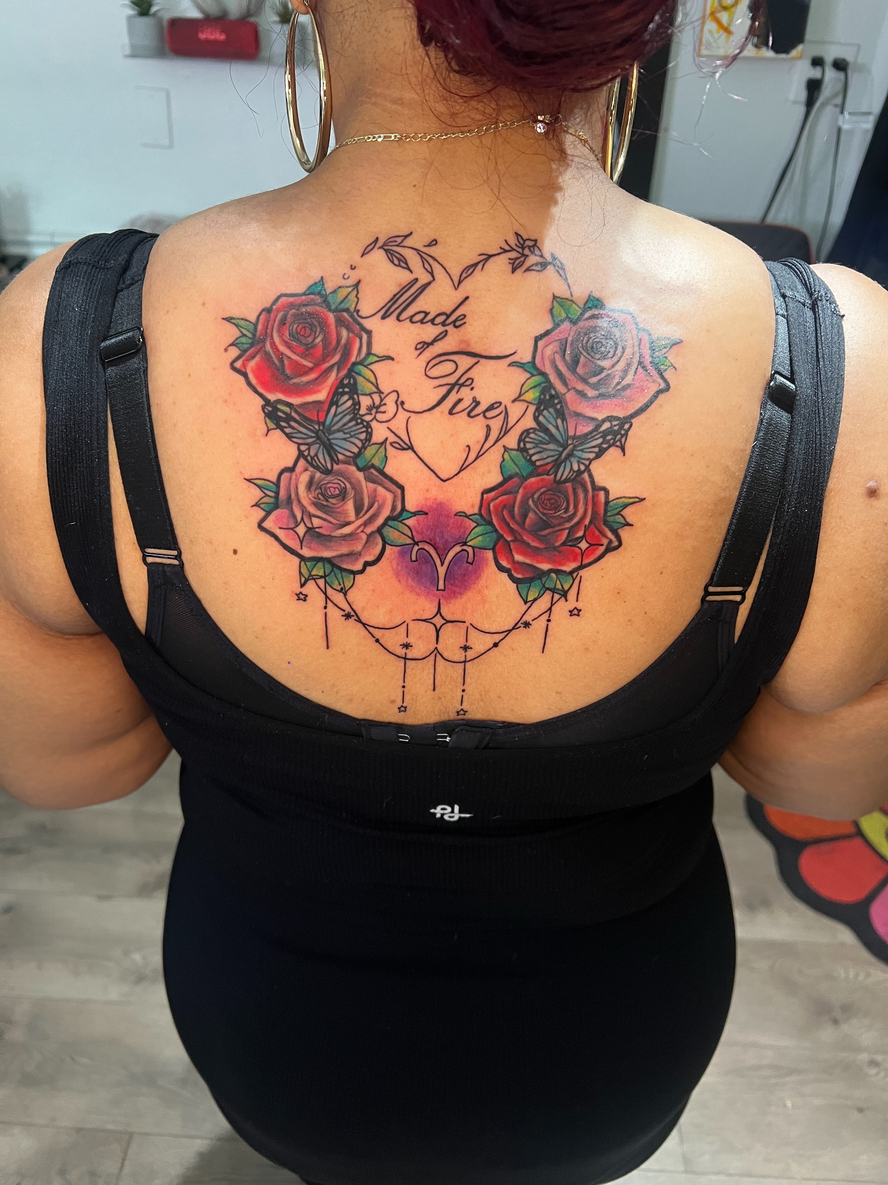 Roses and heart American traditional tattoo on the back by Justx4rt