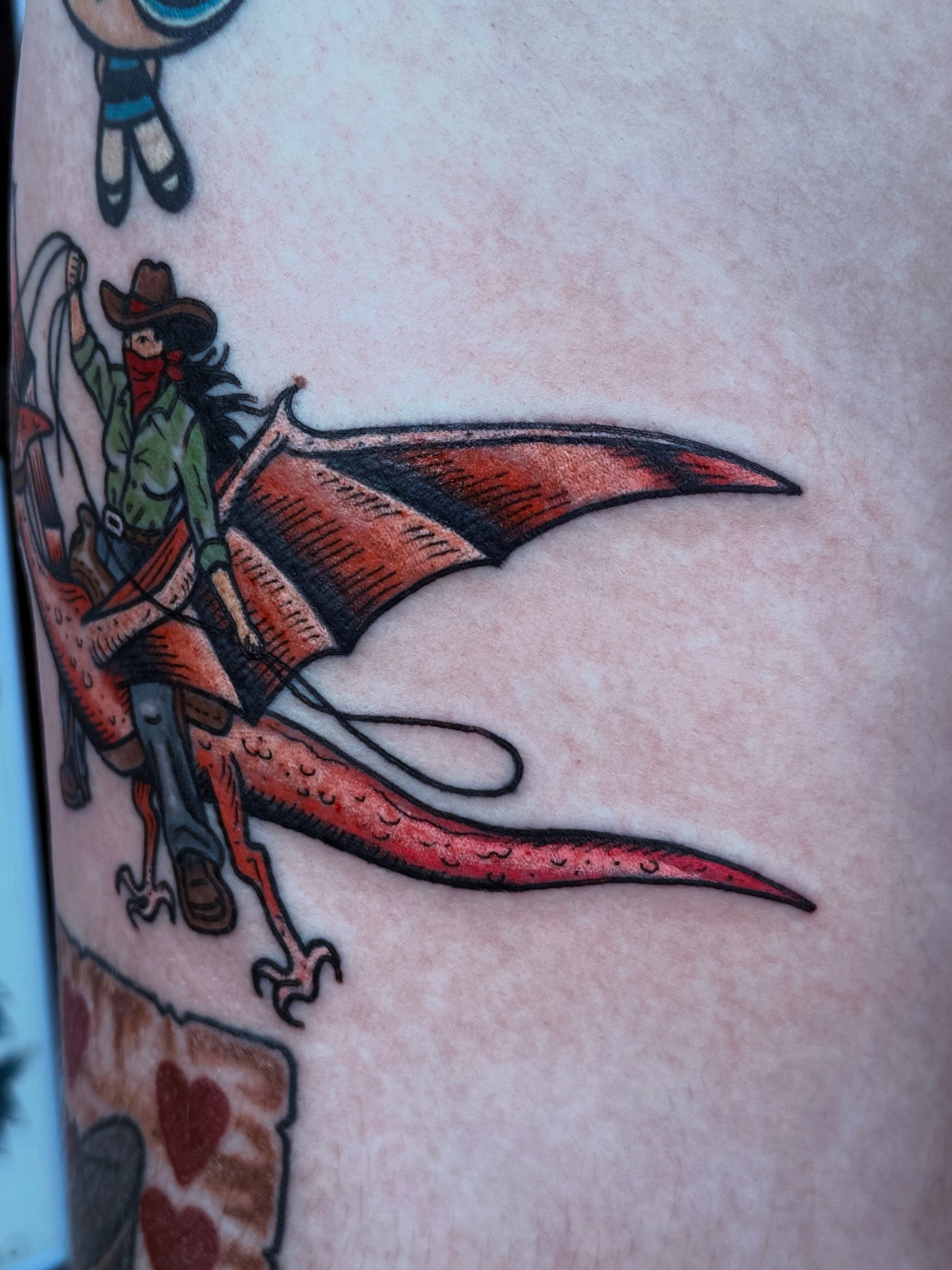 Cowboy riding dragon American traditional tattoo on the forearm by Timothy Kenee