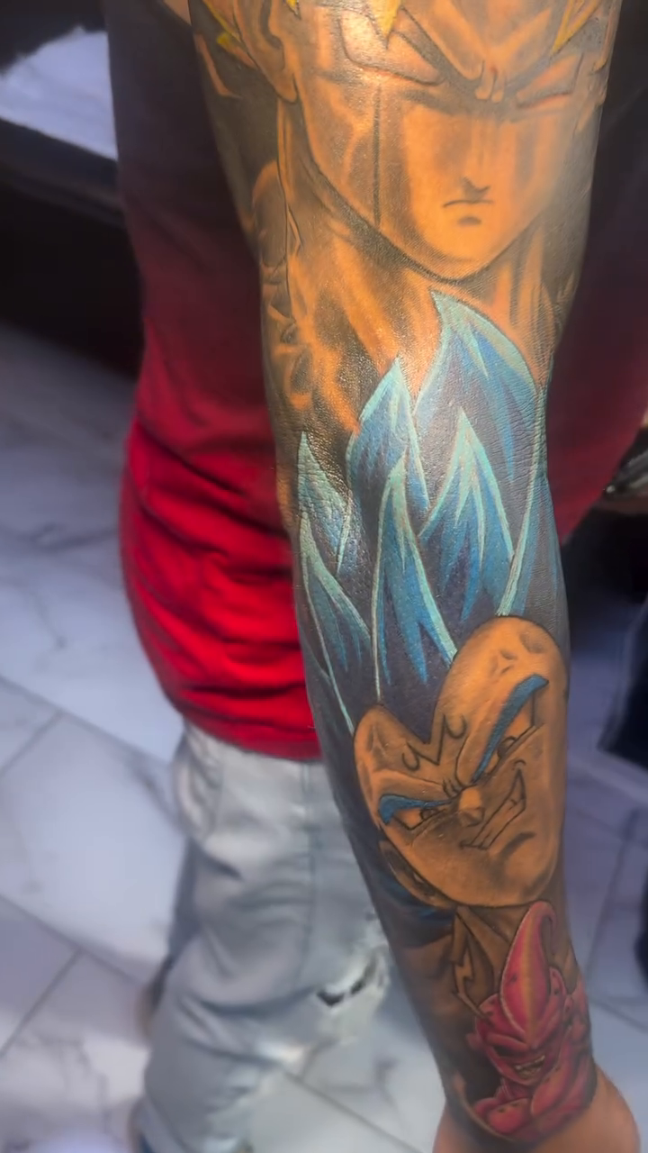 Goku and vegeta anime tattoo on the upper arm by Jose Onasis Disla, New York, New York