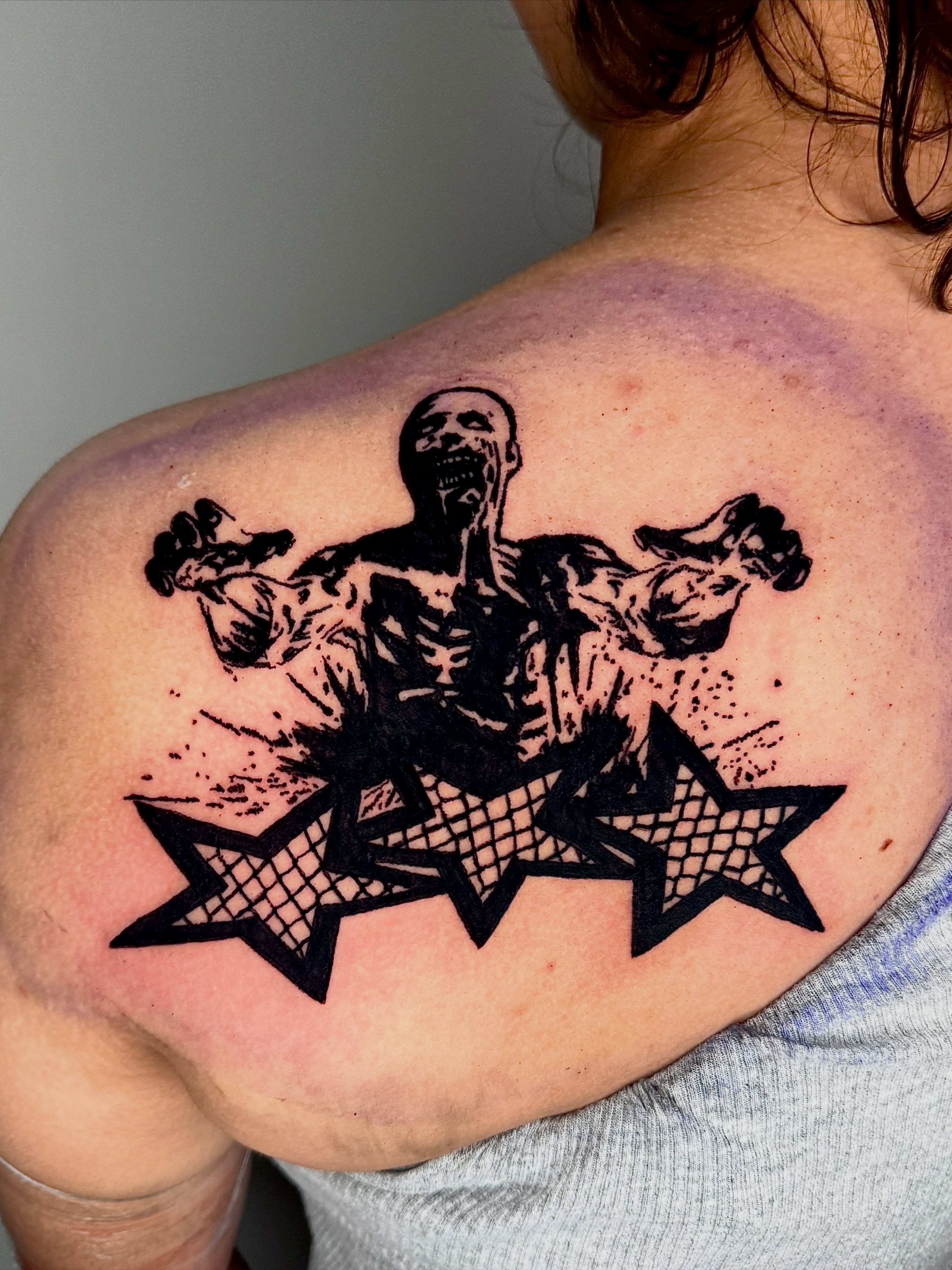 Zombie black and grey tattoo on the shoulder by 𝔠𝔲𝔯𝔱𝔦𝔰 ~ tattoo artist