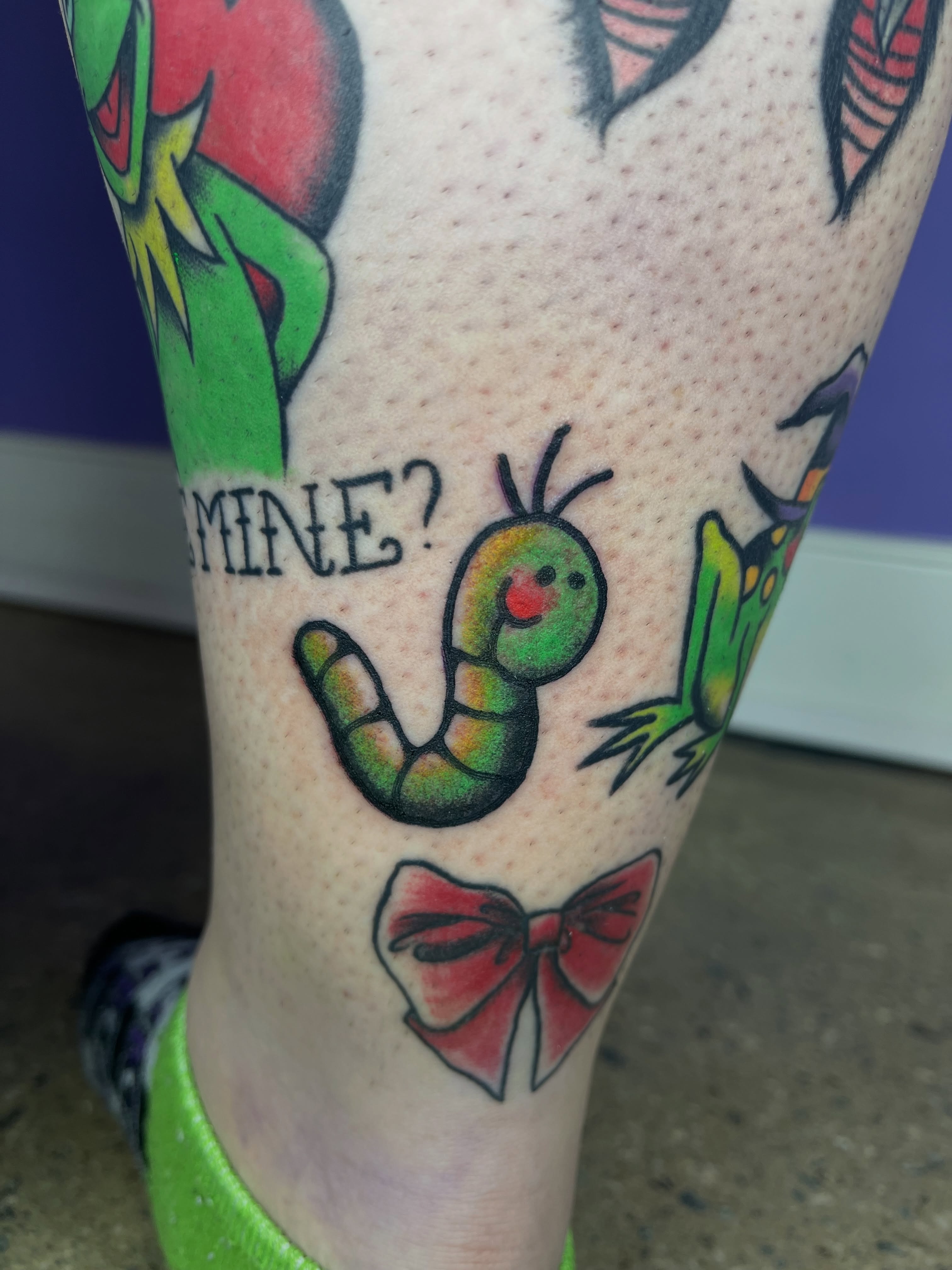 Worm and bow tie American traditional tattoo on the leg by Autumn**🍓NOW BOOKING