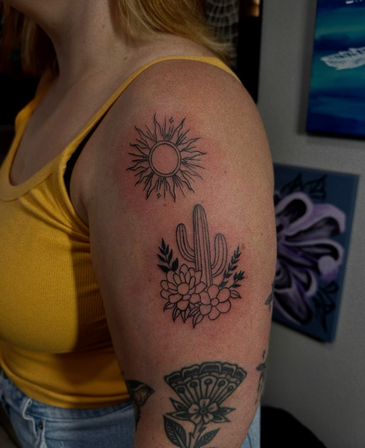 Sun and cactus black and grey tattoo on the shoulder by Marly Quinn