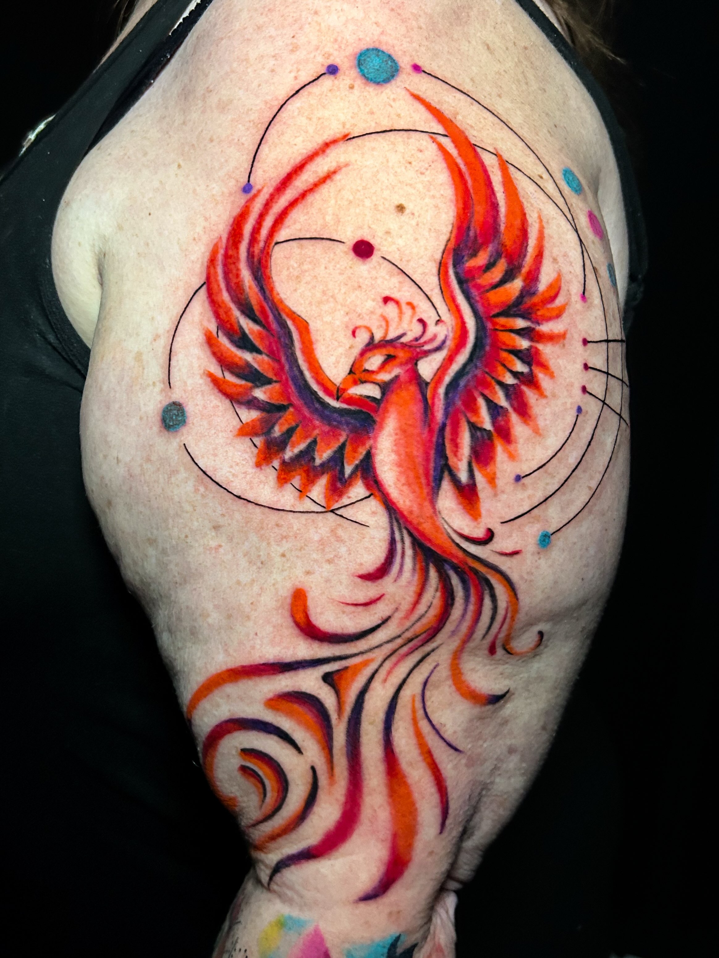 Phoenix new school tattoo on the shoulder by Maia Pizarro
