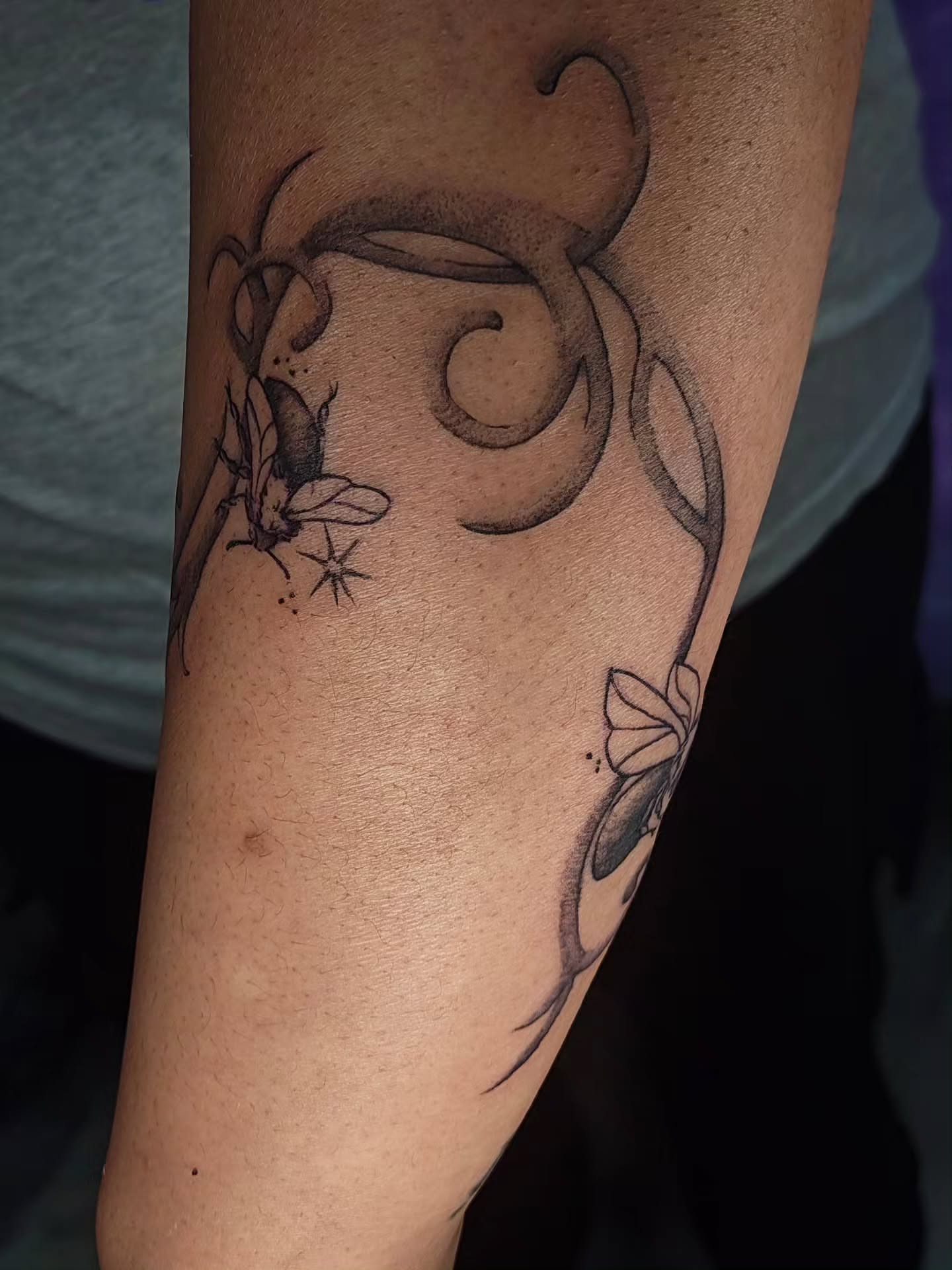Insect and swirls black and grey tattoo on the forearm by Luna 🌙