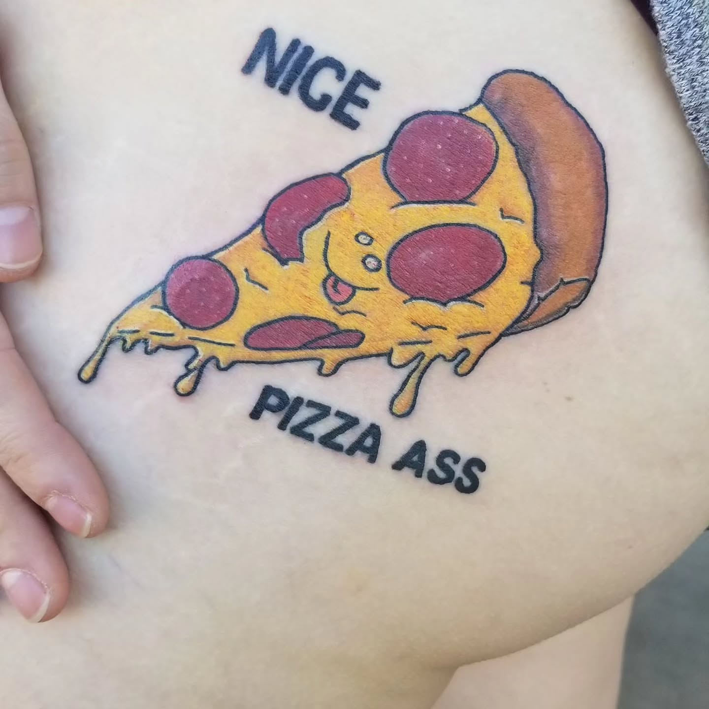 Pizza slice dotwork tattoo on the thigh by Captain Michael Devious
