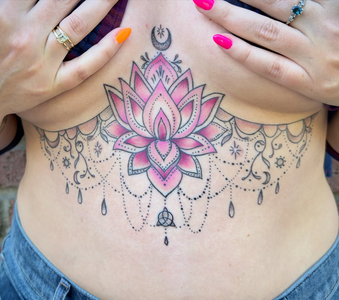 Lotus flower dotwork tattoo on the torso by Charlotte (Luna), Seattle, Washington