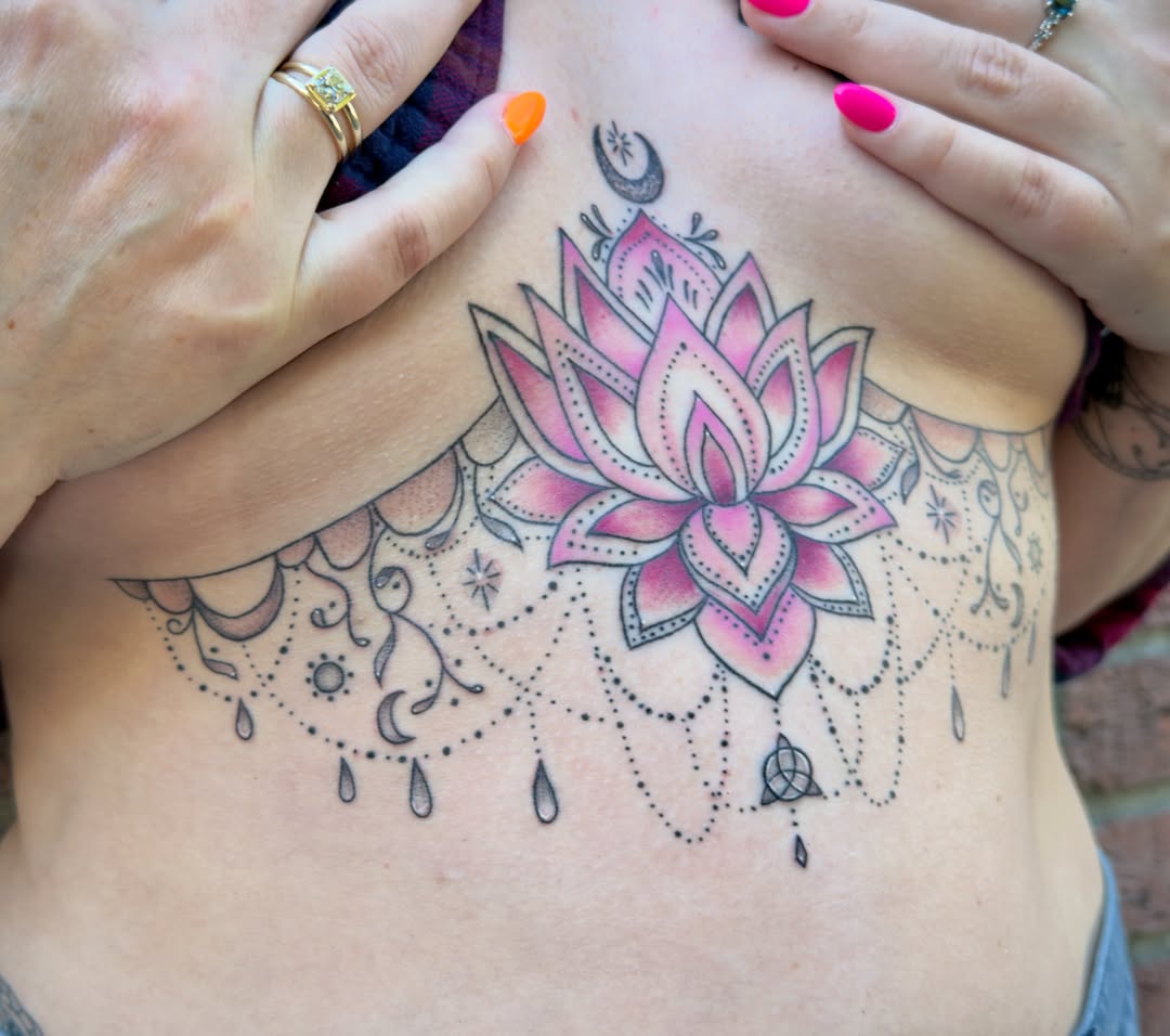 Lotus flower dotwork tattoo on the chest by Charlotte (Luna), Seattle, Washington