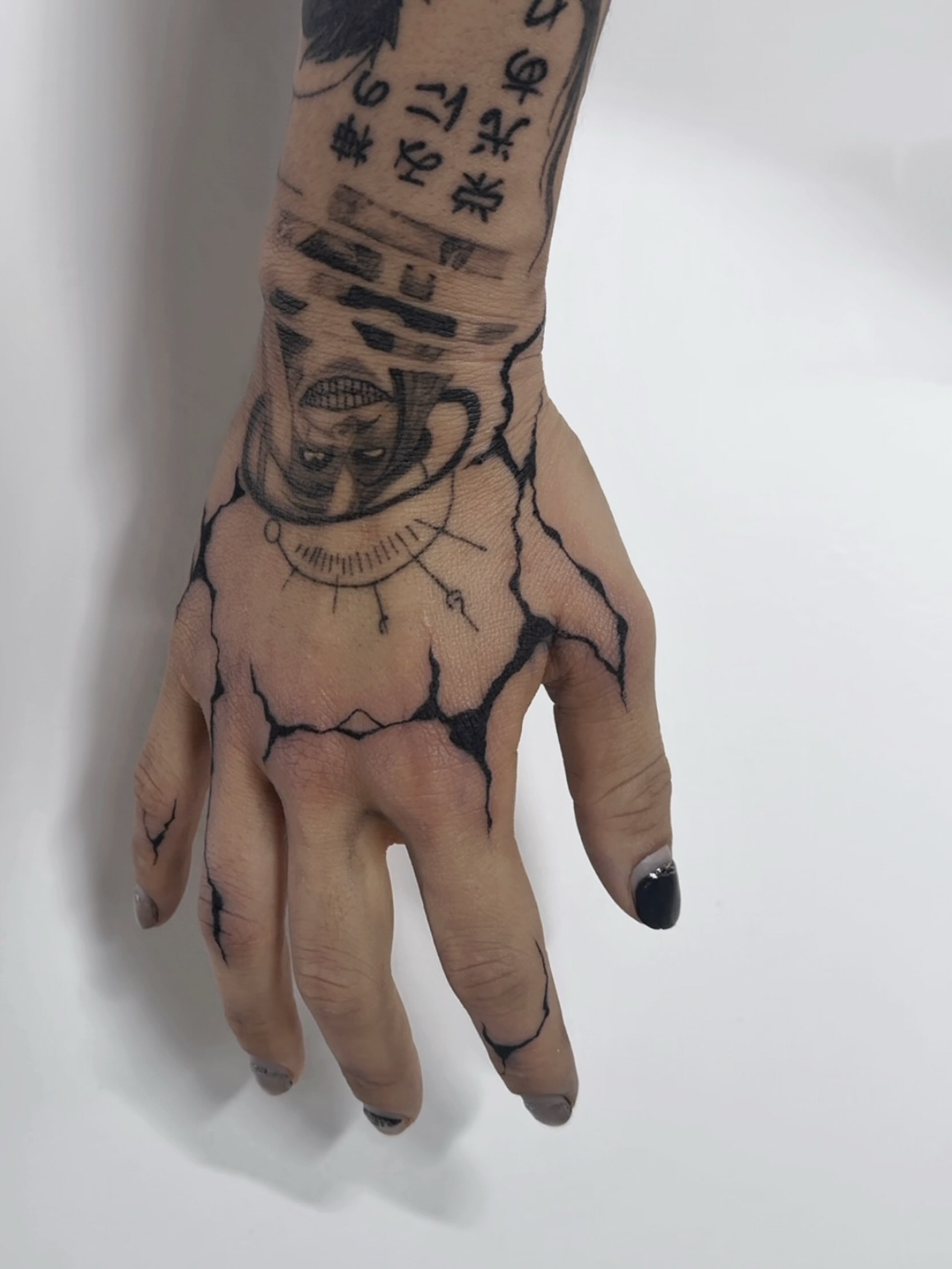 Astronaut realism tattoo on the hand by Kaelyn