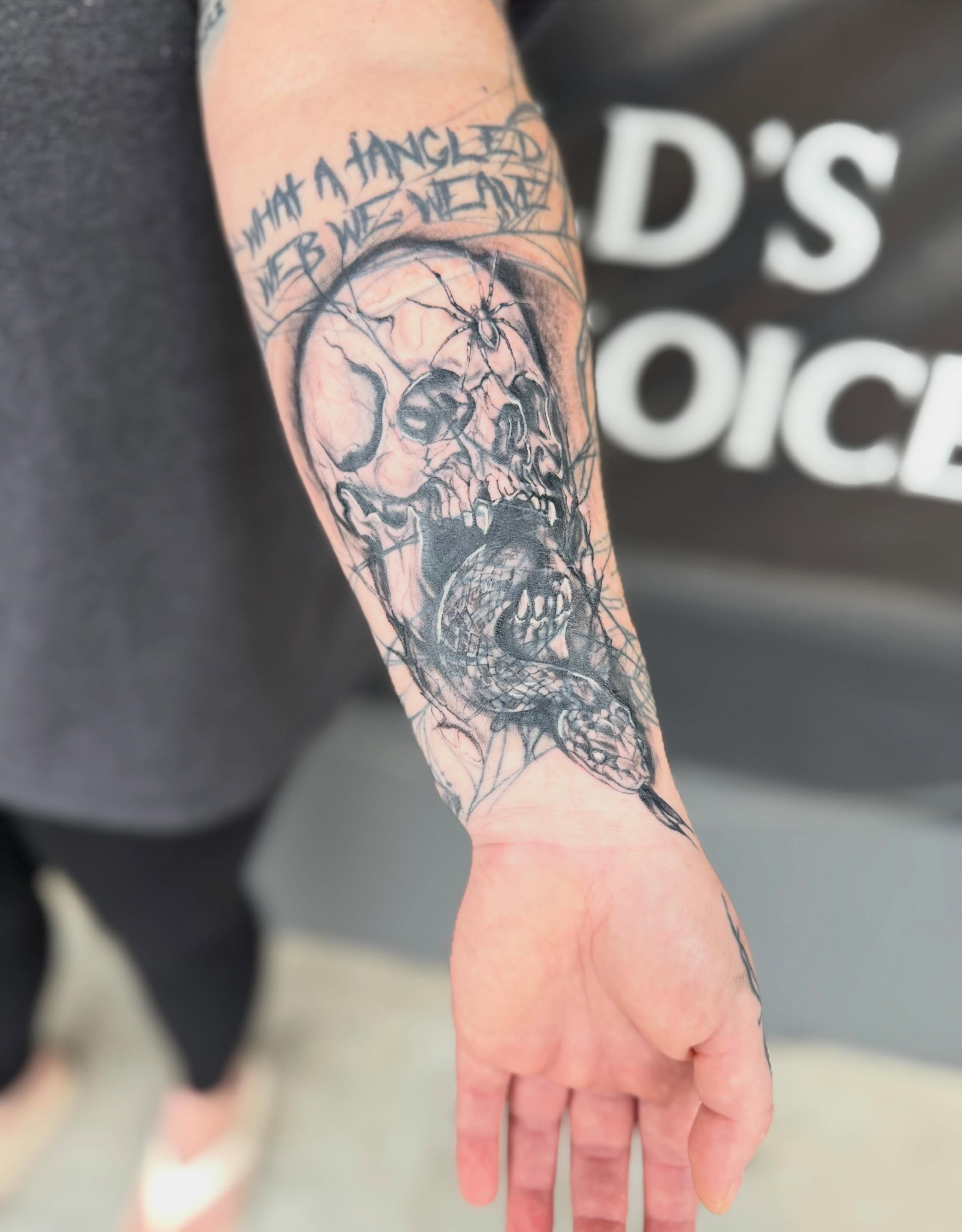 Skull and spider realism tattoo on the forearm by Gisette Gomez