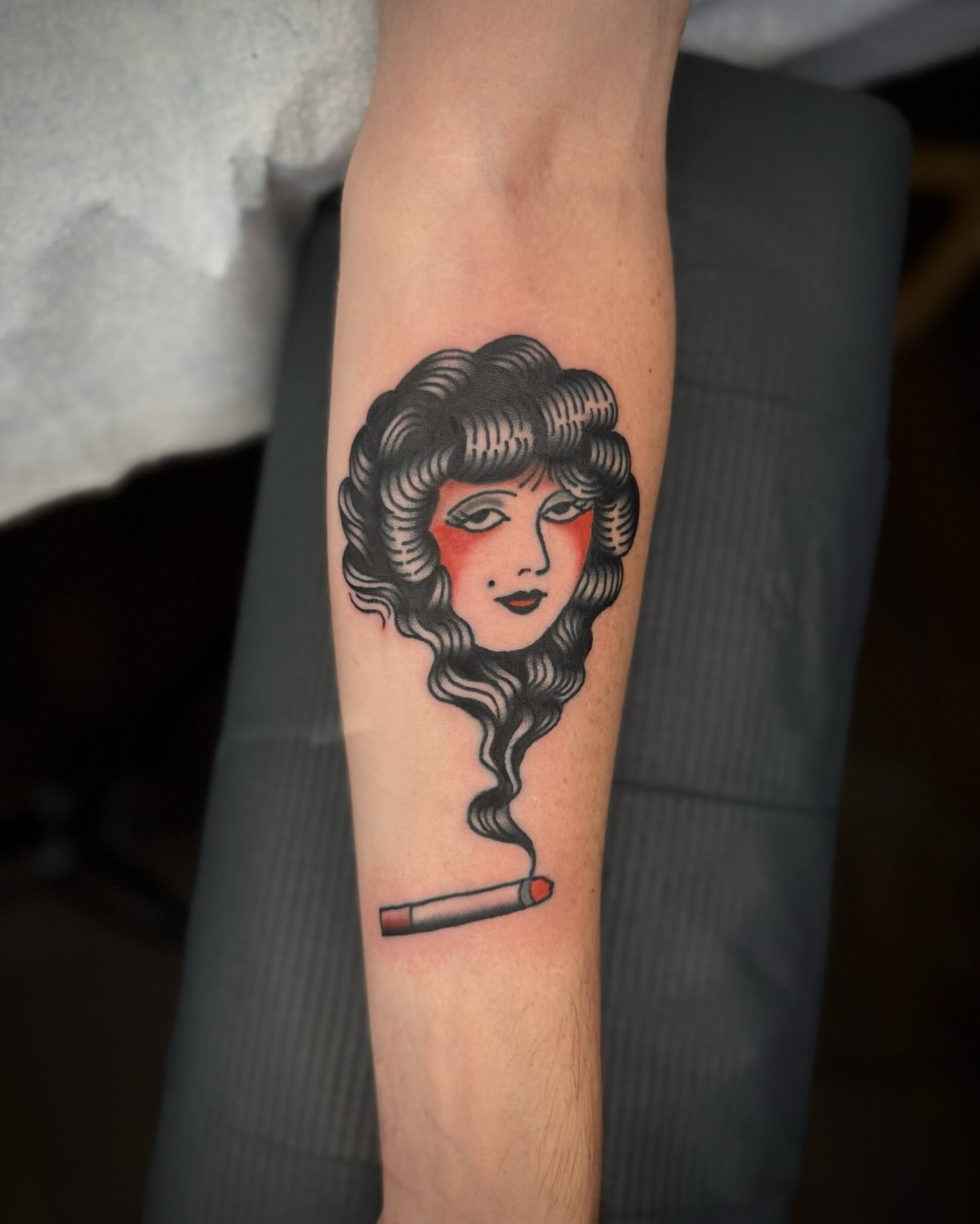 Flapper girl American traditional tattoo on the forearm by kalli berry
