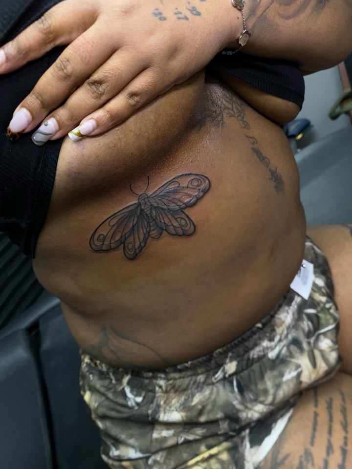 Butterfly black and grey tattoo on the ribs by Mariš¤, Chicago, Illinois