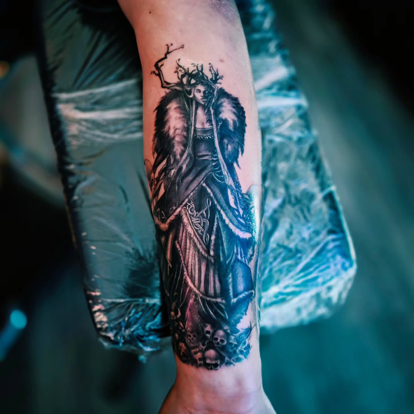Woman with tree crown dark realism tattoo on the forearm by Luke Jordan Ink, Louisville, Colorado