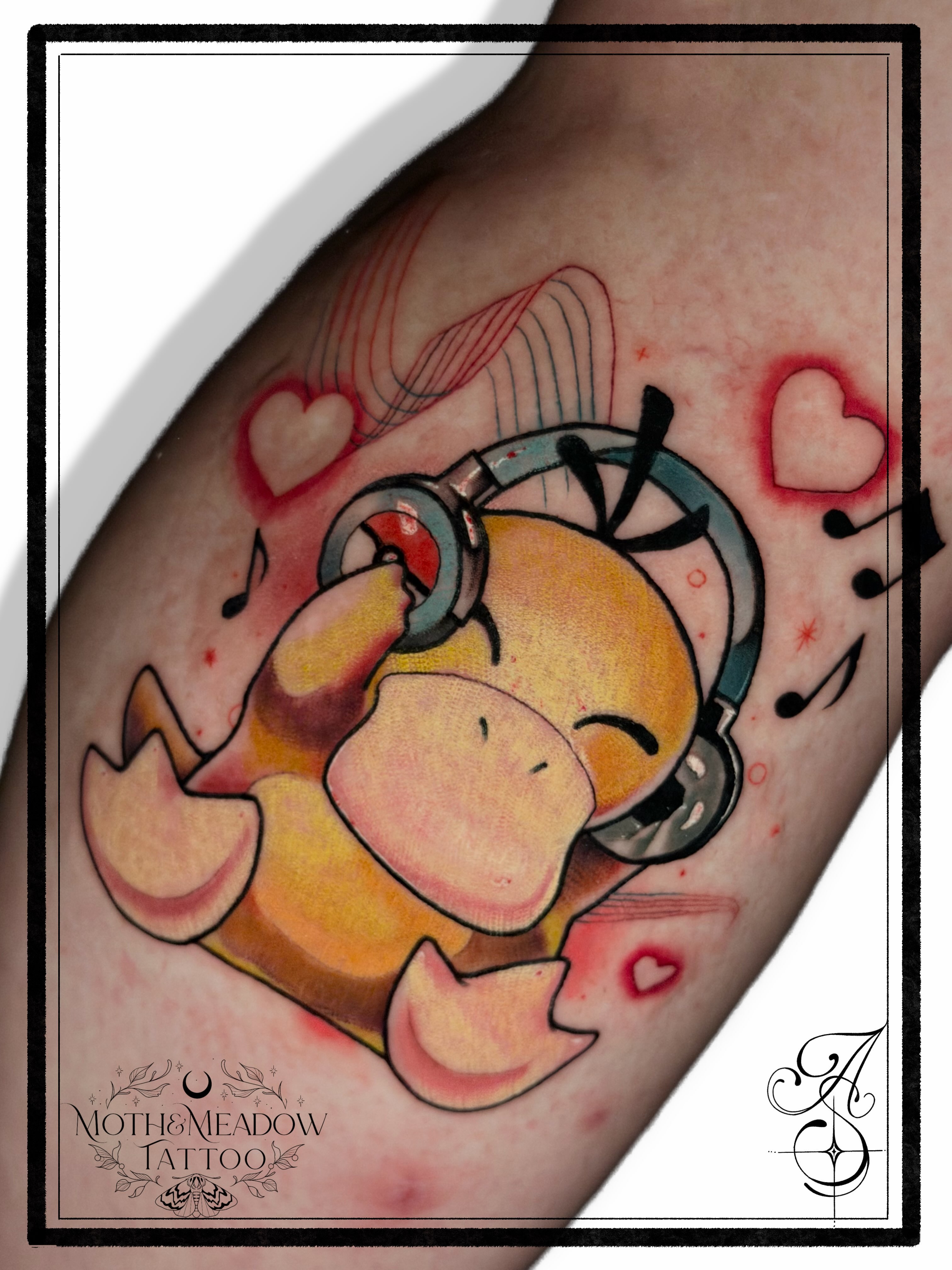 Chibi character with headphones new school tattoo on the forearm by Ash Sansoucie