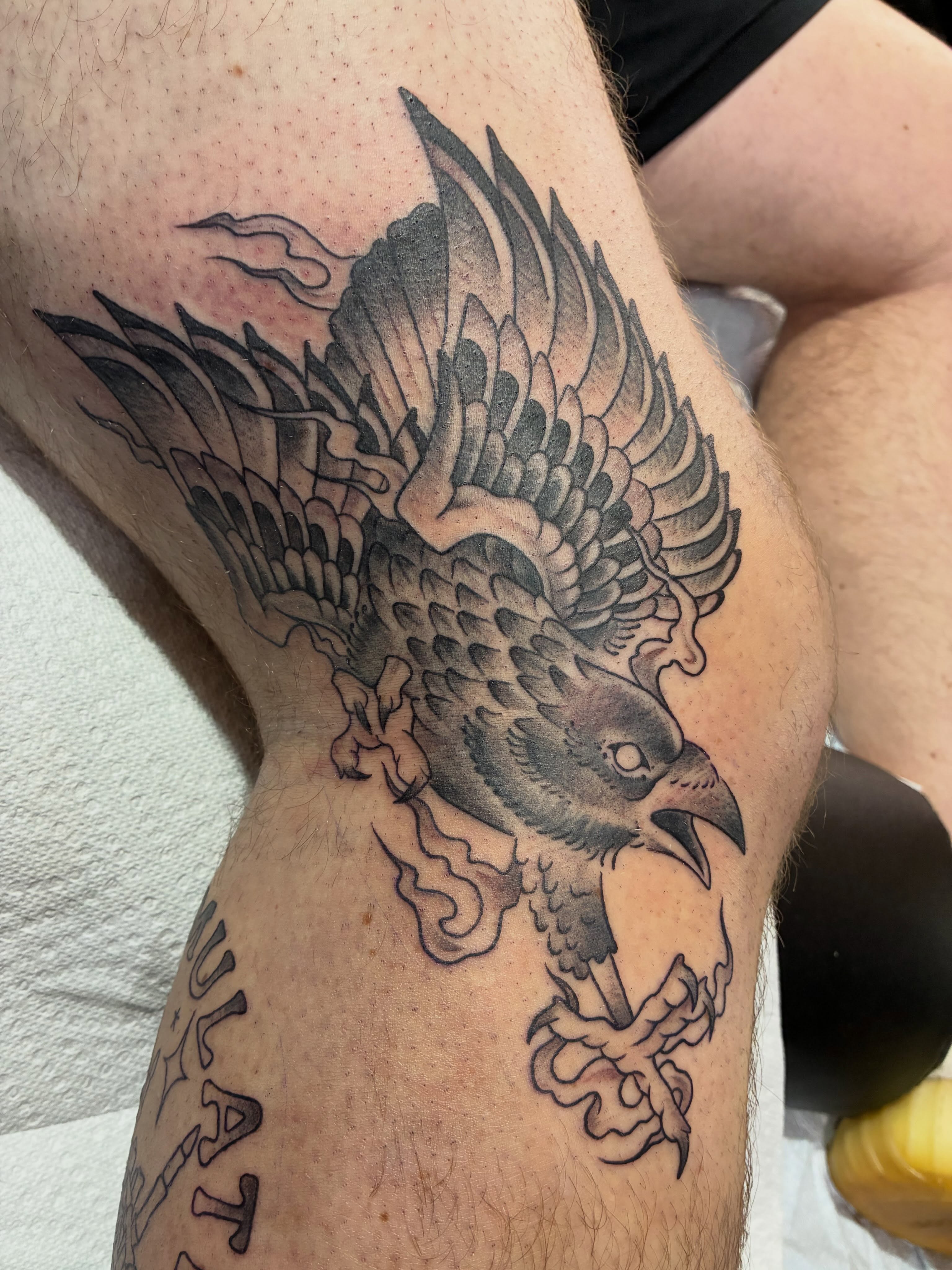 Eagle black and grey tattoo on the thigh by Natalie Spuhler