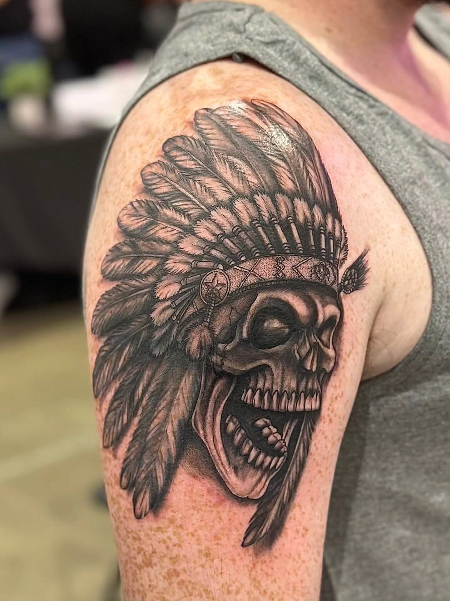 Skull headdress realism tattoo on the shoulder by BeardedMoney