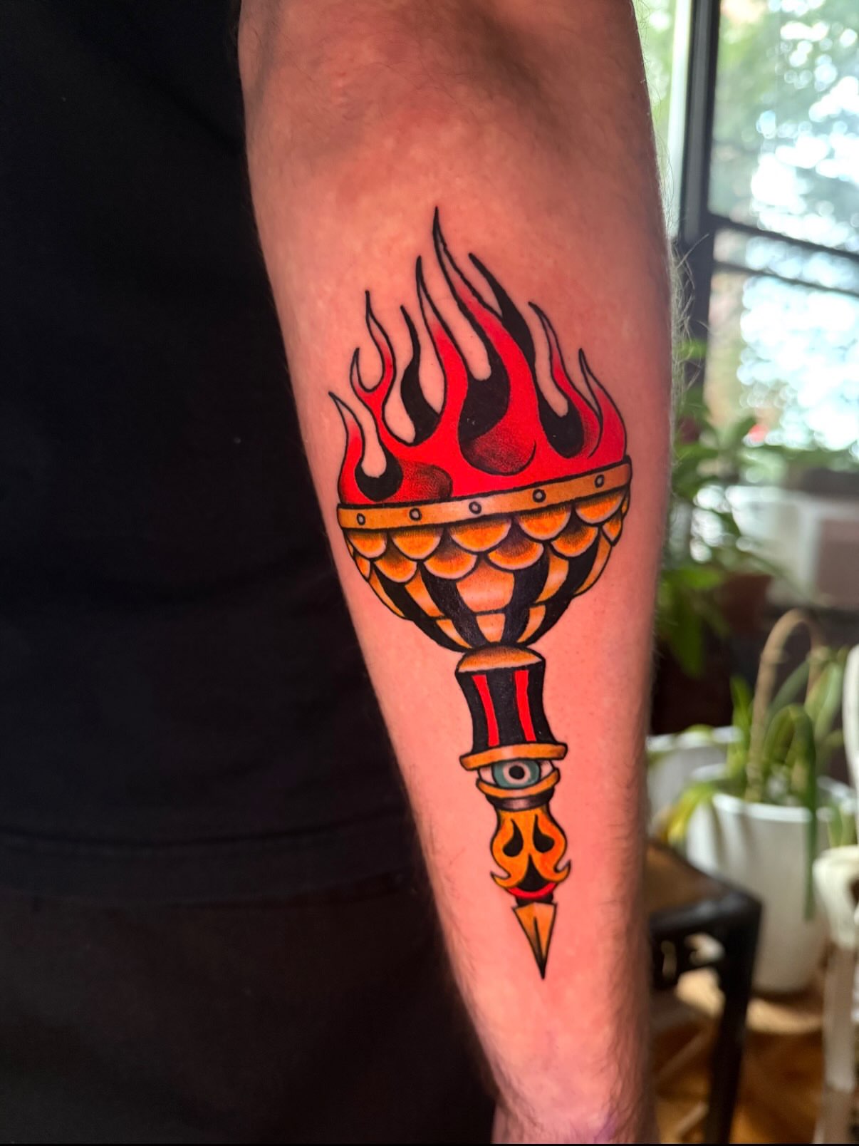 Flame torch American traditional tattoo on the forearm by marlena borscheid