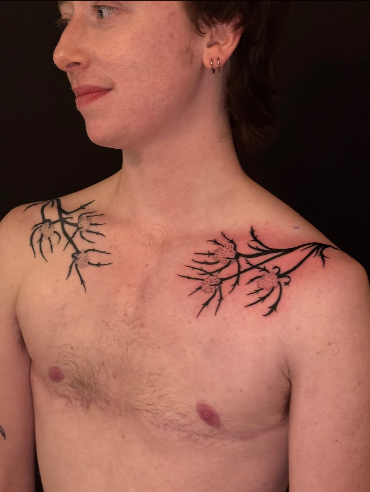 Twisted branches black and grey tattoo on the chest by marlena borscheid