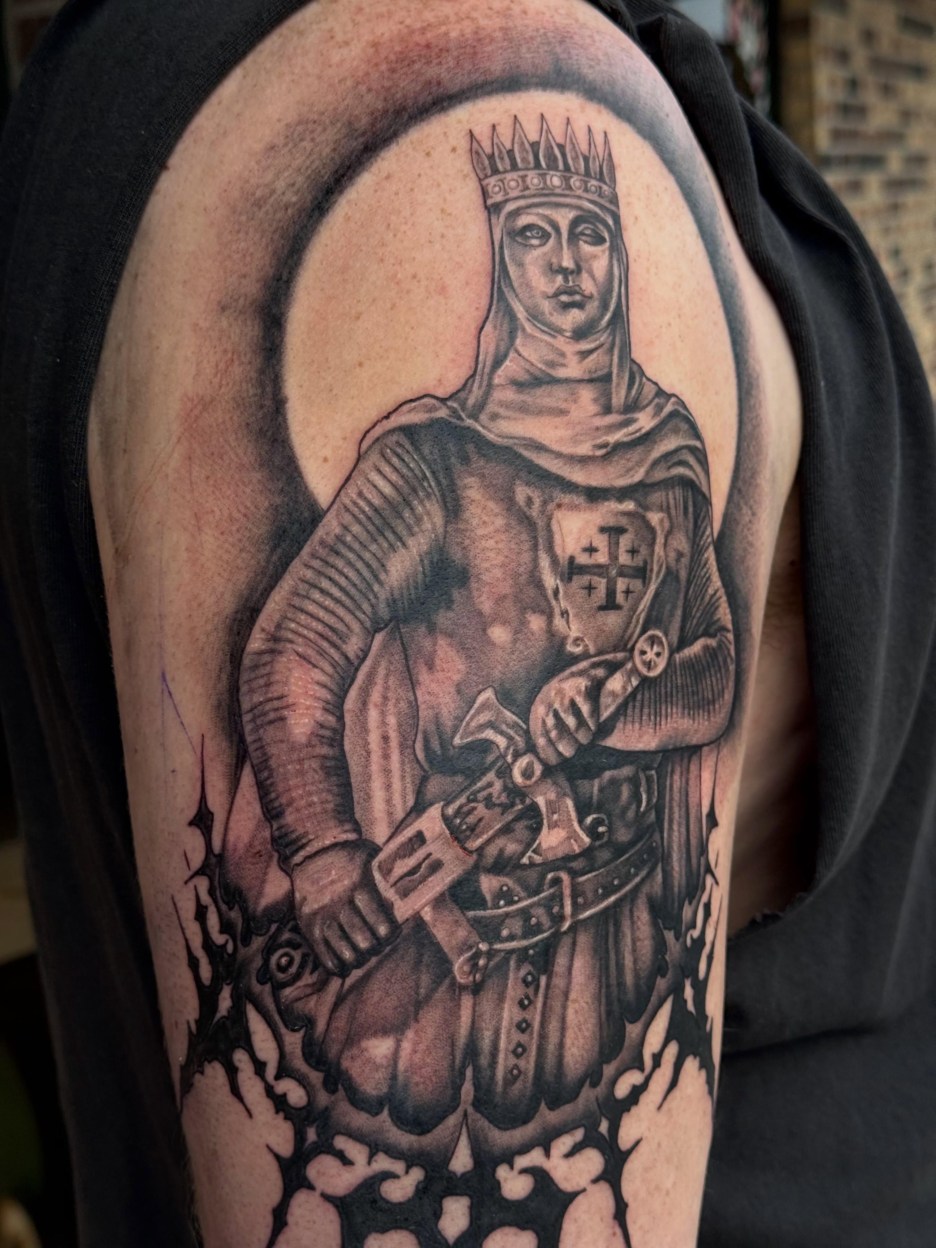 Knight black and grey tattoo on the shoulder by Lauren Horness