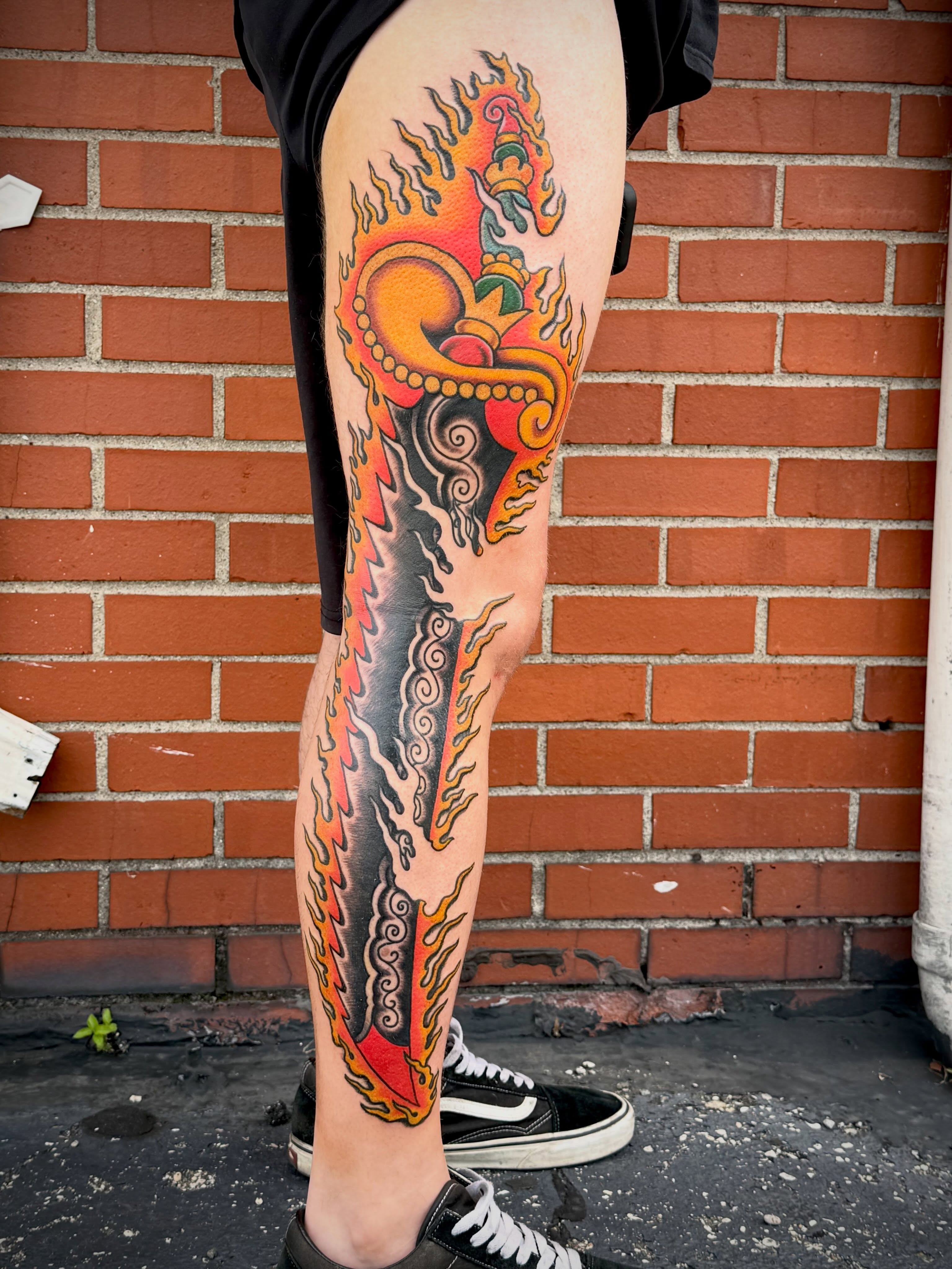 Flame dragon American traditional tattoo on the thigh by KevinBetsch