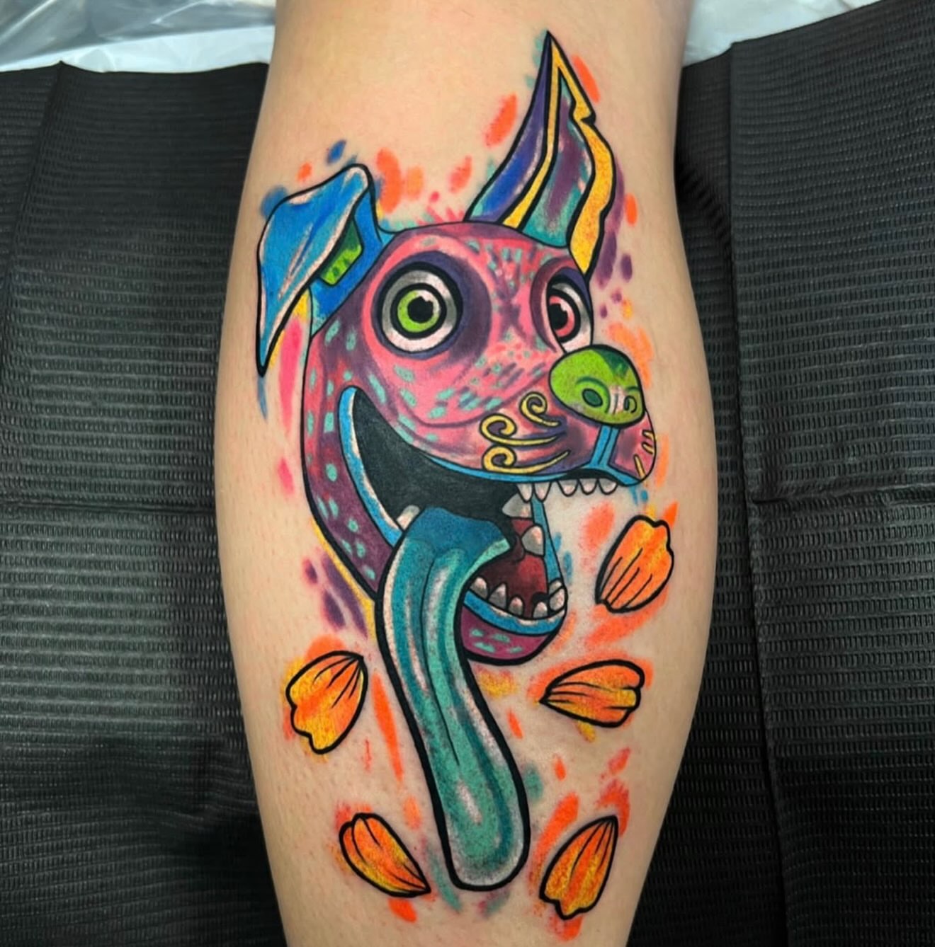Dog new school tattoo on the forearm by Hugh Anthony Washington, Hattiesburg, Mississippi