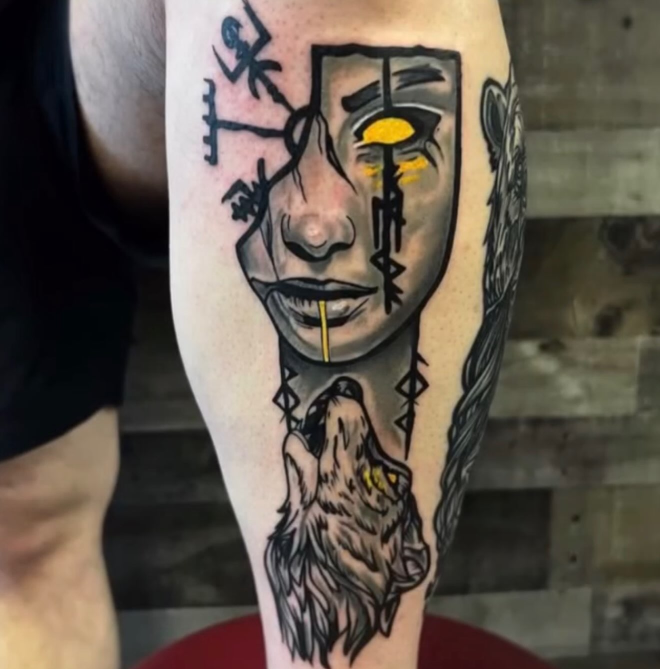Wolf howling at moon neo-traditional tattoo on the forearm by Hugh Anthony Washington, Hattiesburg, Mississippi