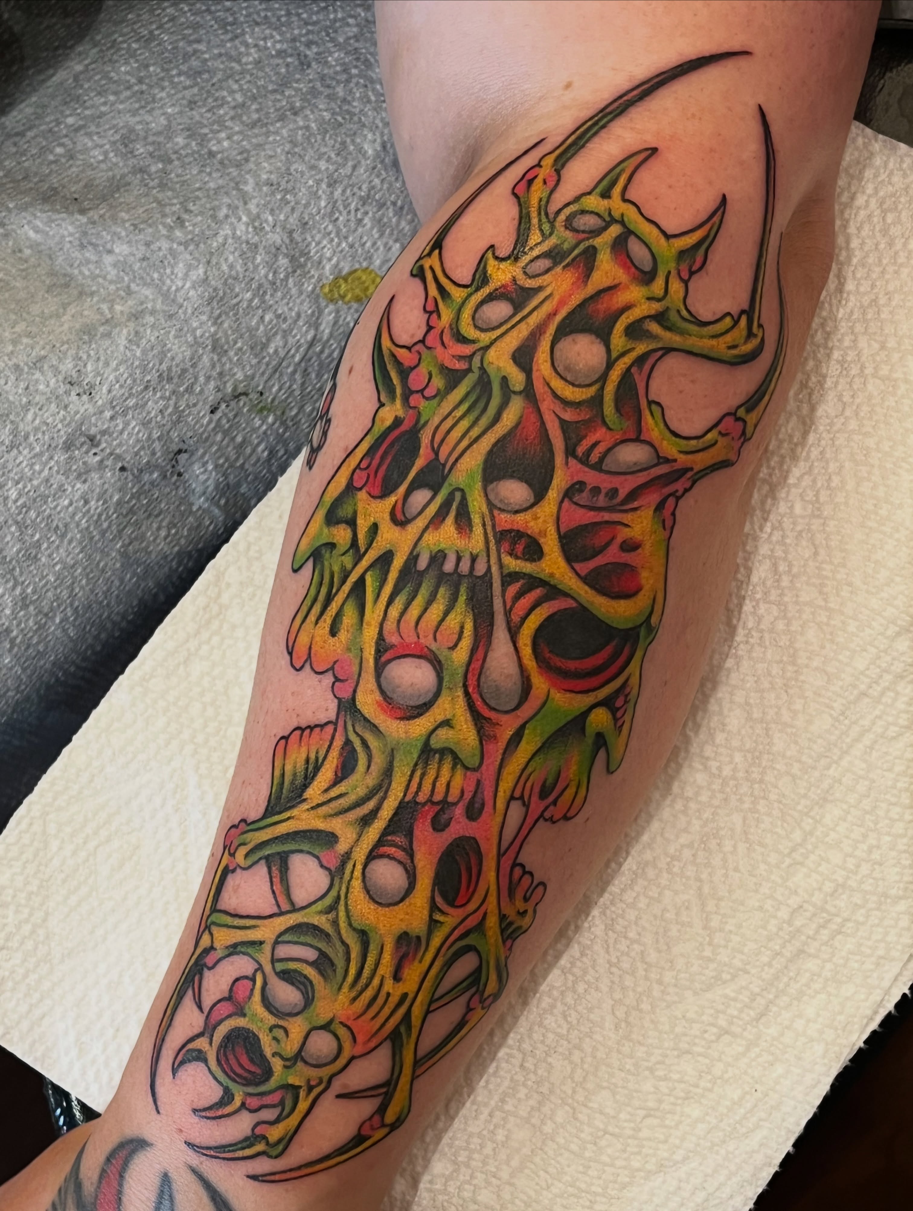 Abstract skull new school tattoo on the forearm by Campbell Zane Alexander