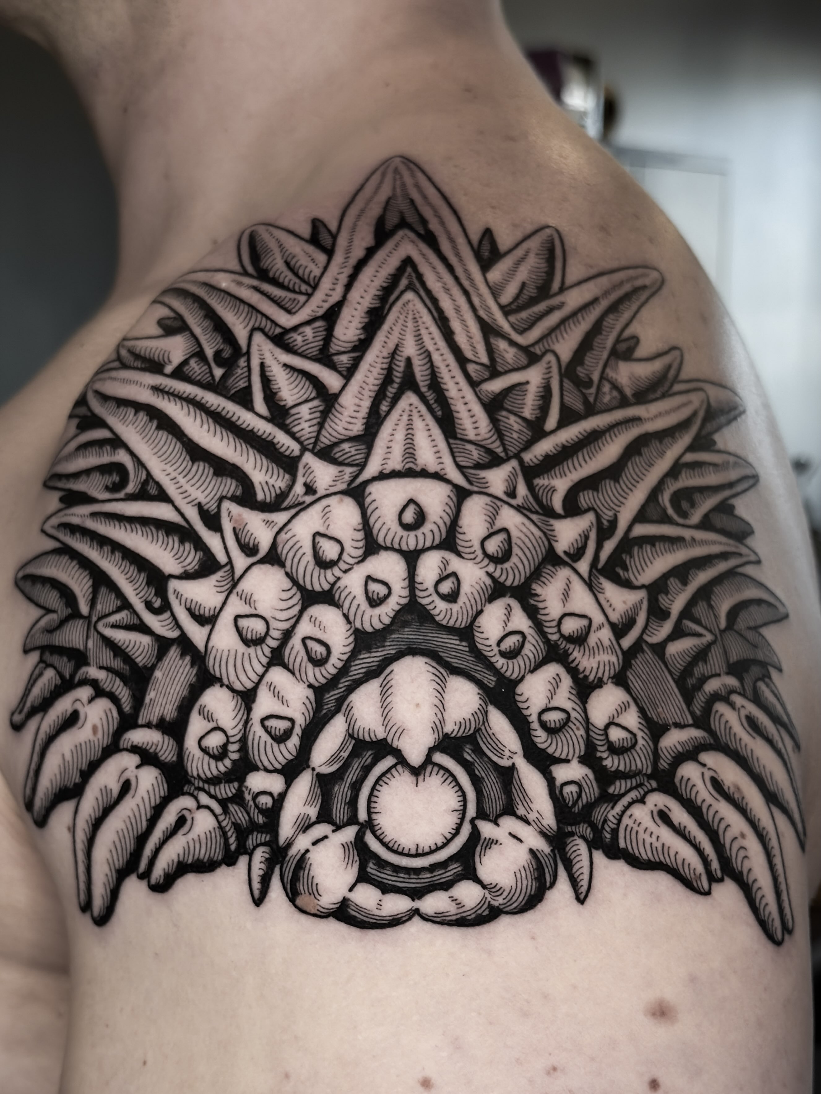 Geometric mandala geometric tattoo on the chest by Dokk
