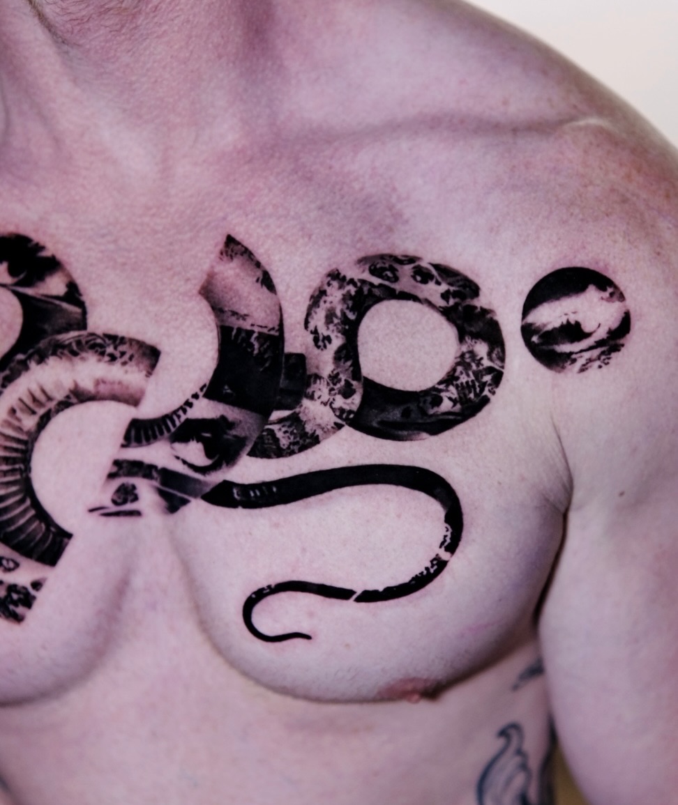 Snake black and grey tattoo on the chest by 𝐌𝐀𝐊𝐒𝐈𝐌 𝐏𝐀𝐓𝐑𝐈𝐂𝐊
