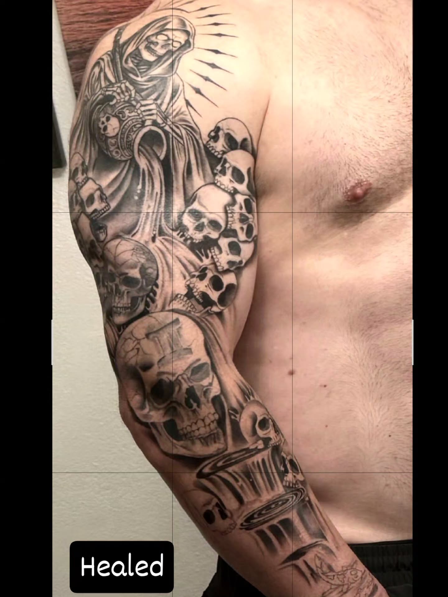 Skeleton and skulls black and grey tattoo on the upper arm by Yvette Cebreros